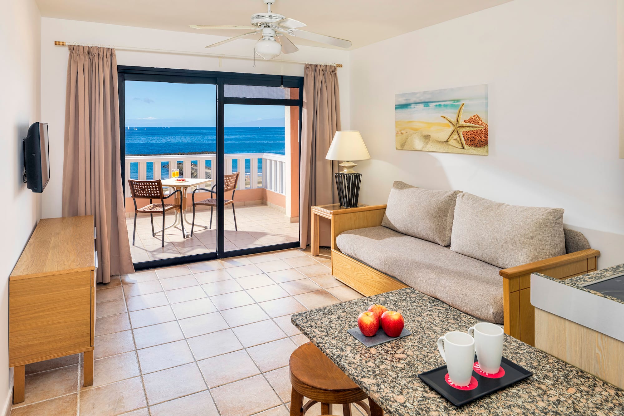 a living room with a couch and a table