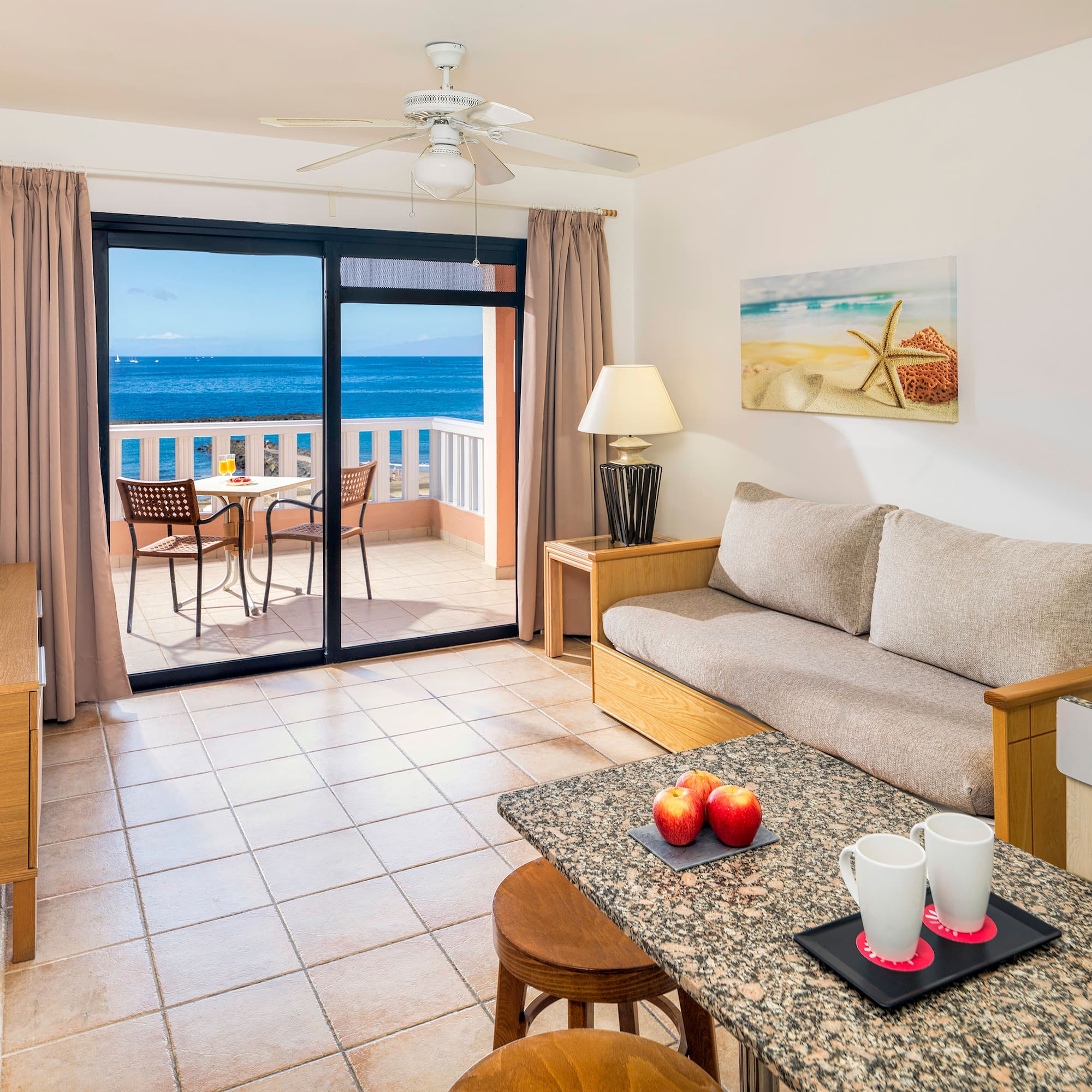 a living room with a couch and a table