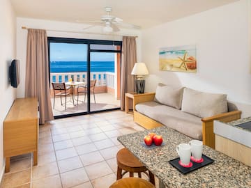 a living room with a couch and a table