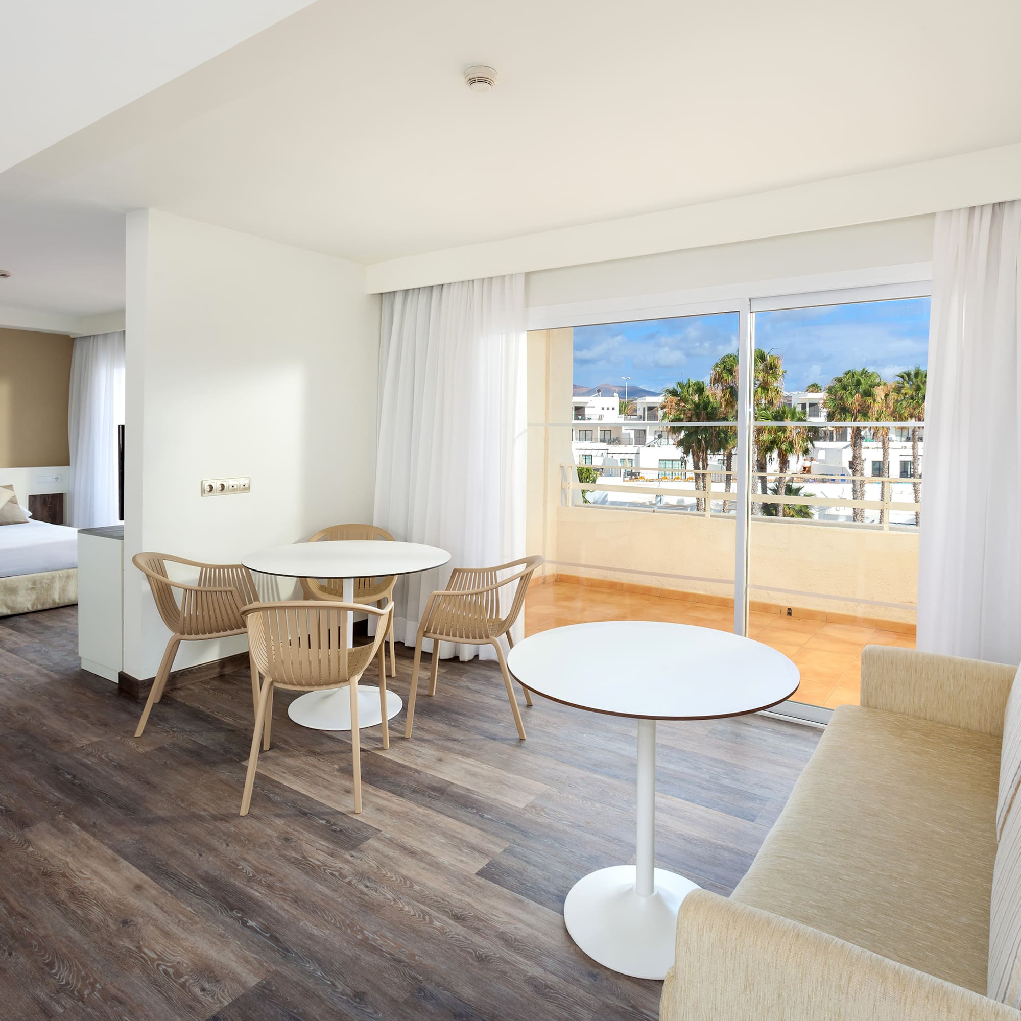 a room with a table and chairs