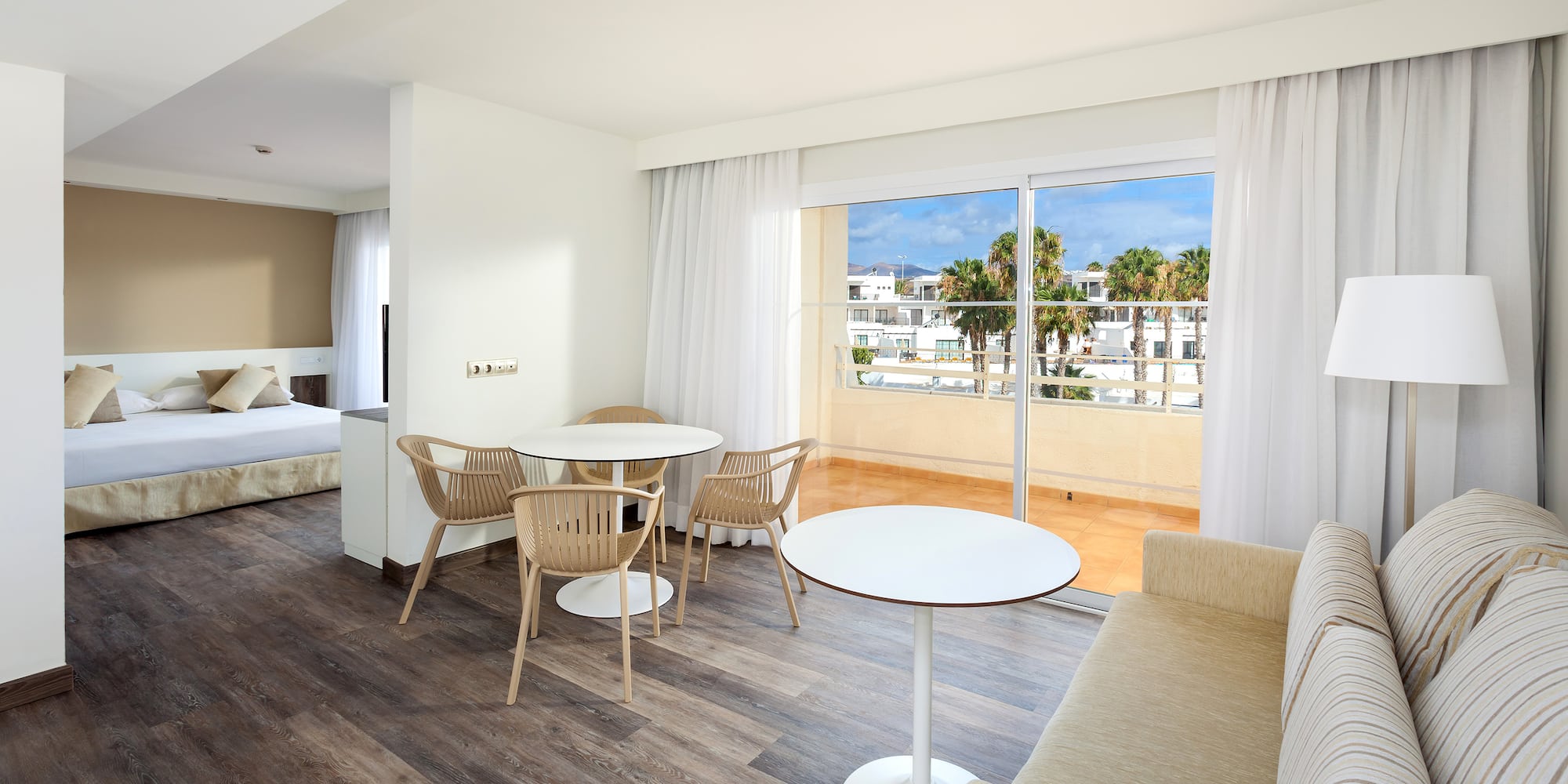 a room with a table and chairs