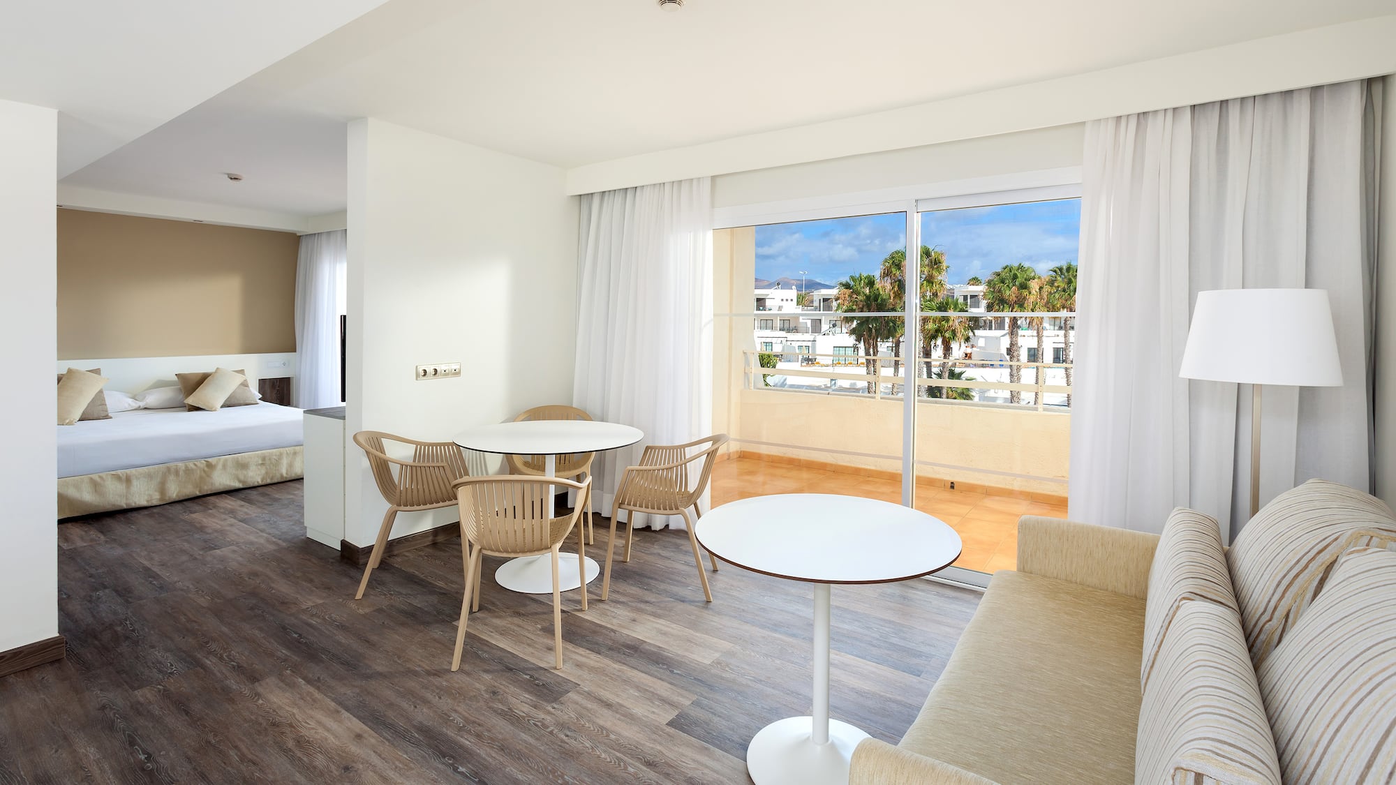 a room with a table and chairs