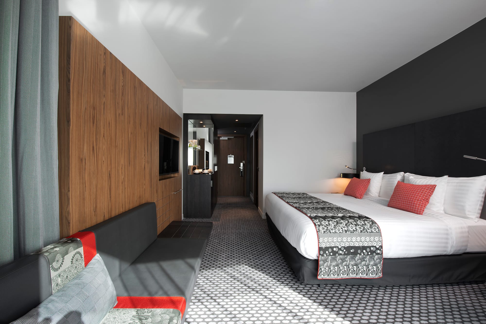 a room with a bed and a couch