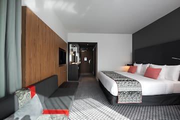 a room with a bed and a couch