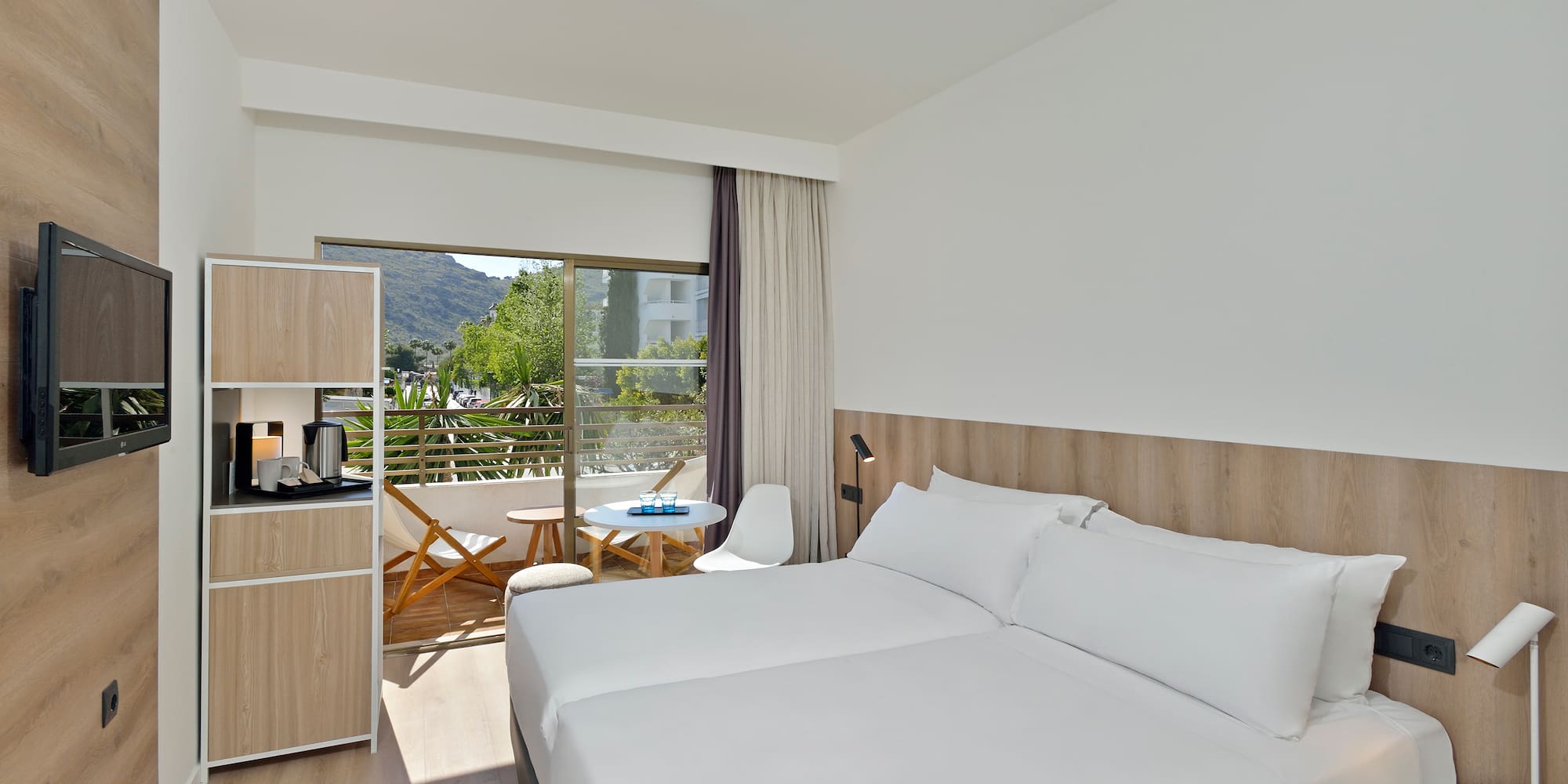 a room with a bed and a table