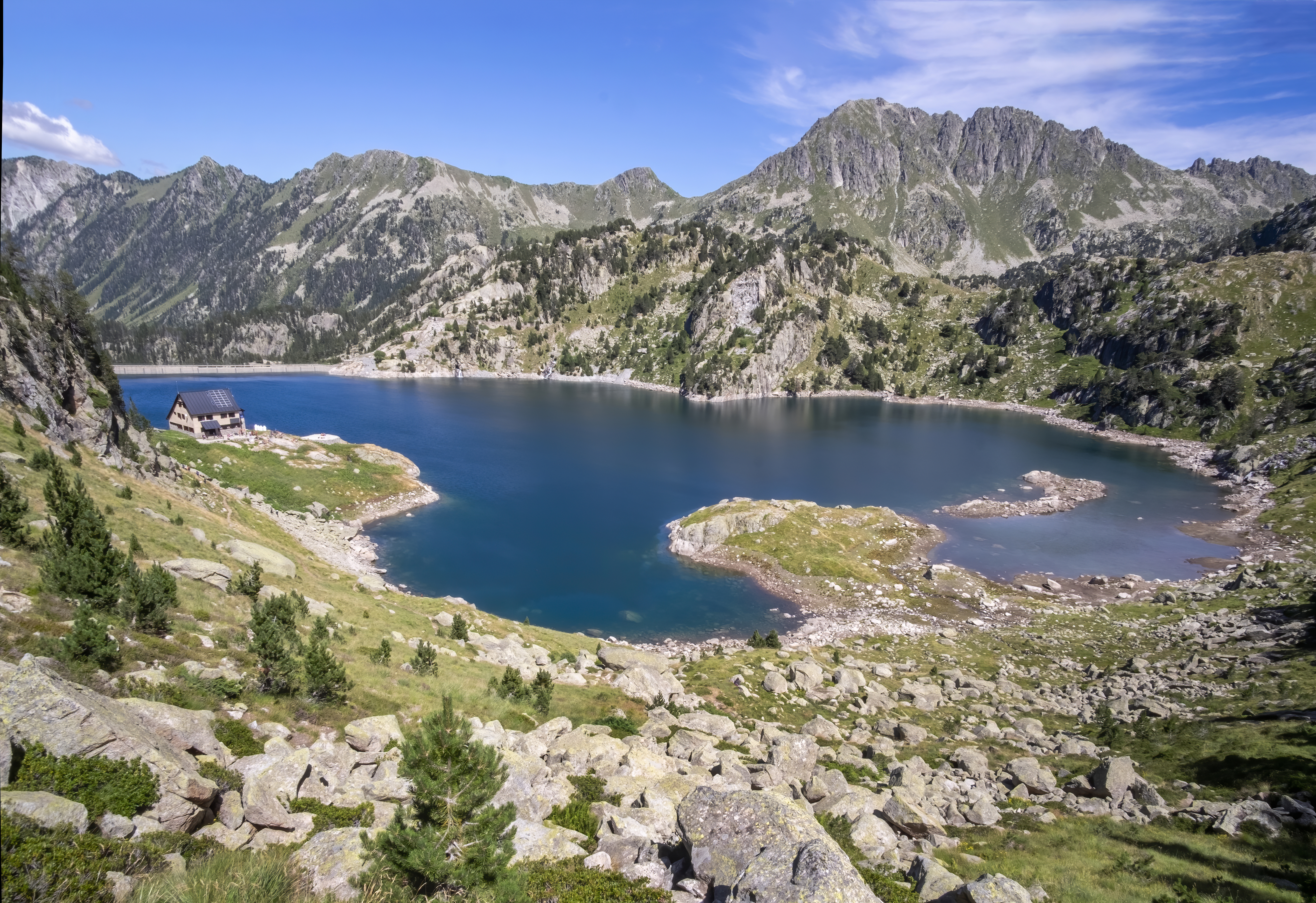 a lake surrounded by mountains