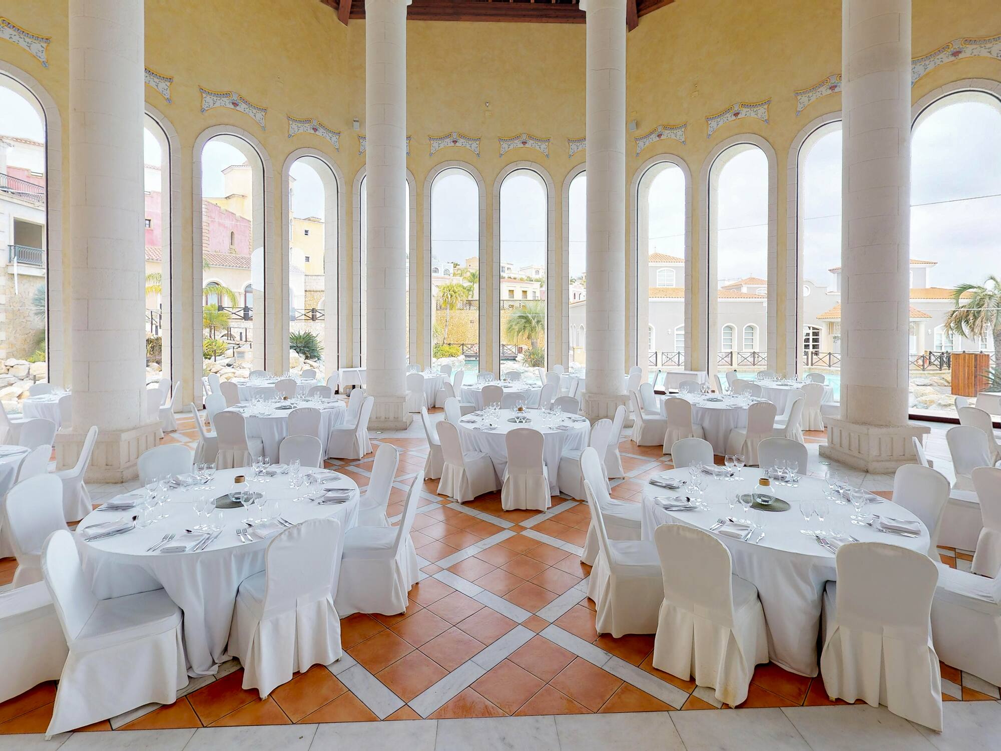 a room with tables and chairs