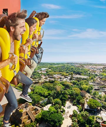 a group of people on a roller coaster
