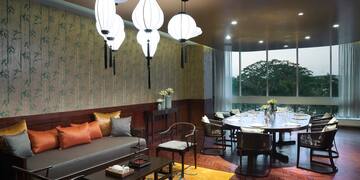 a room with a table and chairs