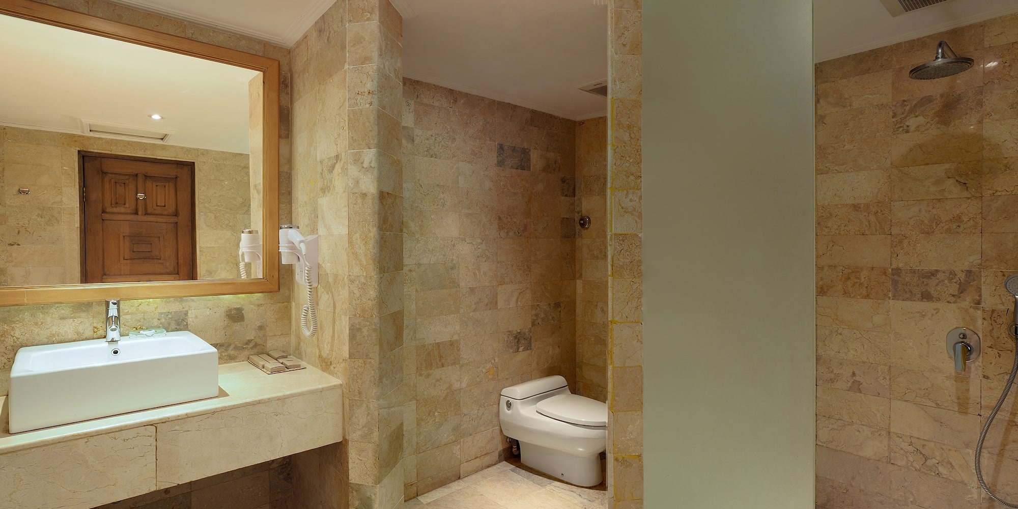 a bathroom with a sink and toilet