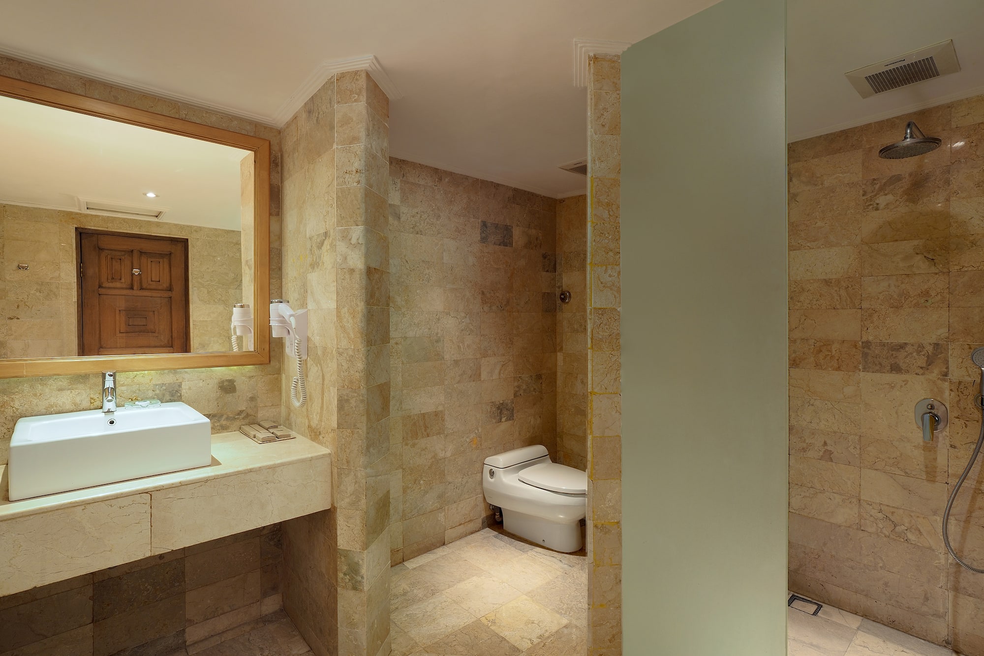 a bathroom with a sink and toilet