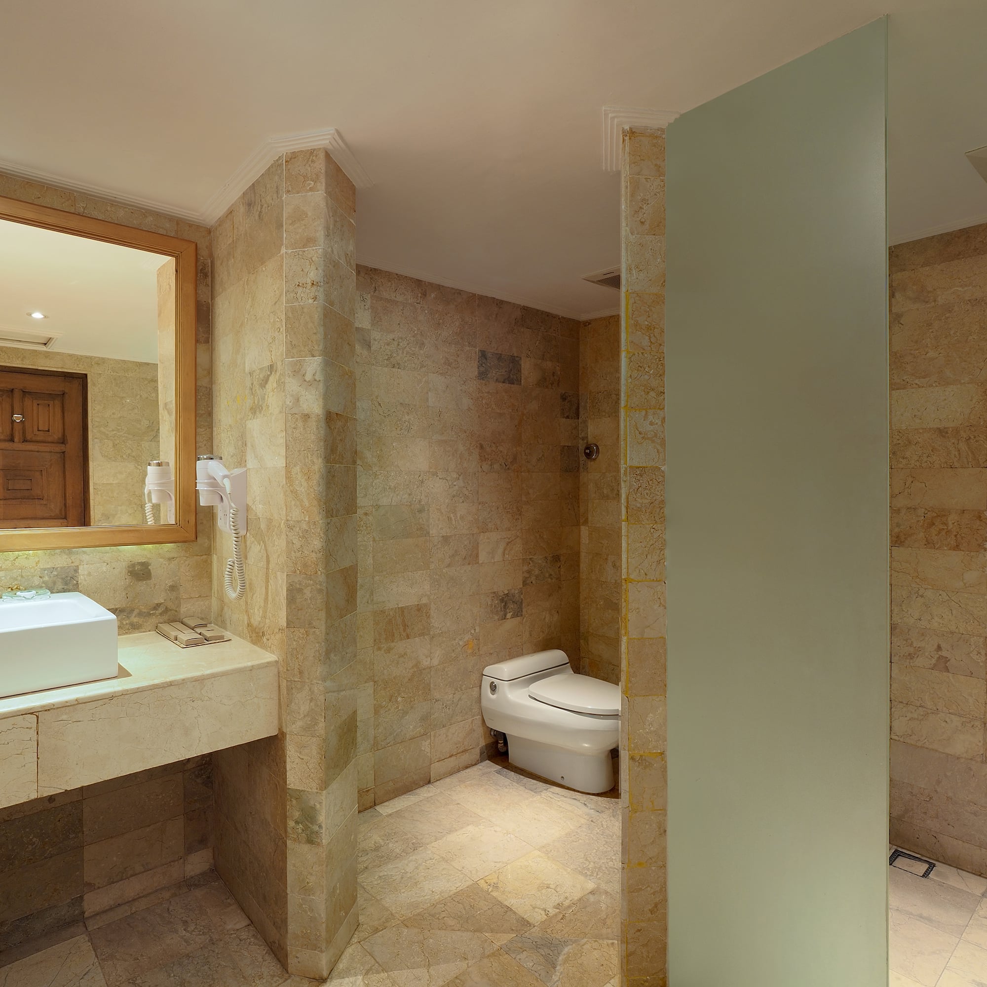 a bathroom with a sink and toilet