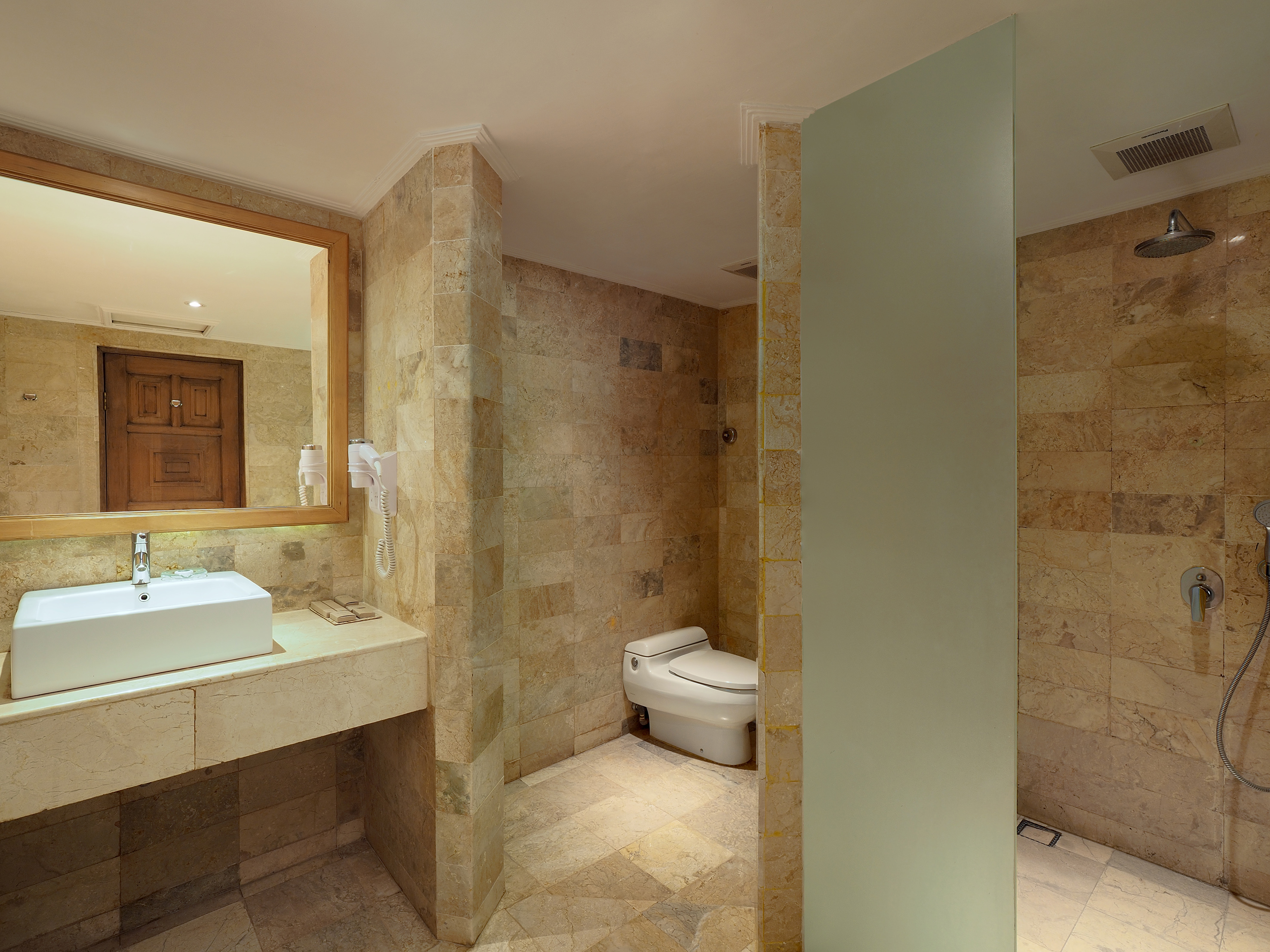 a bathroom with a sink and toilet