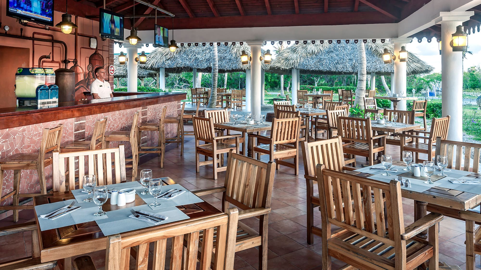 a restaurant with tables and chairs