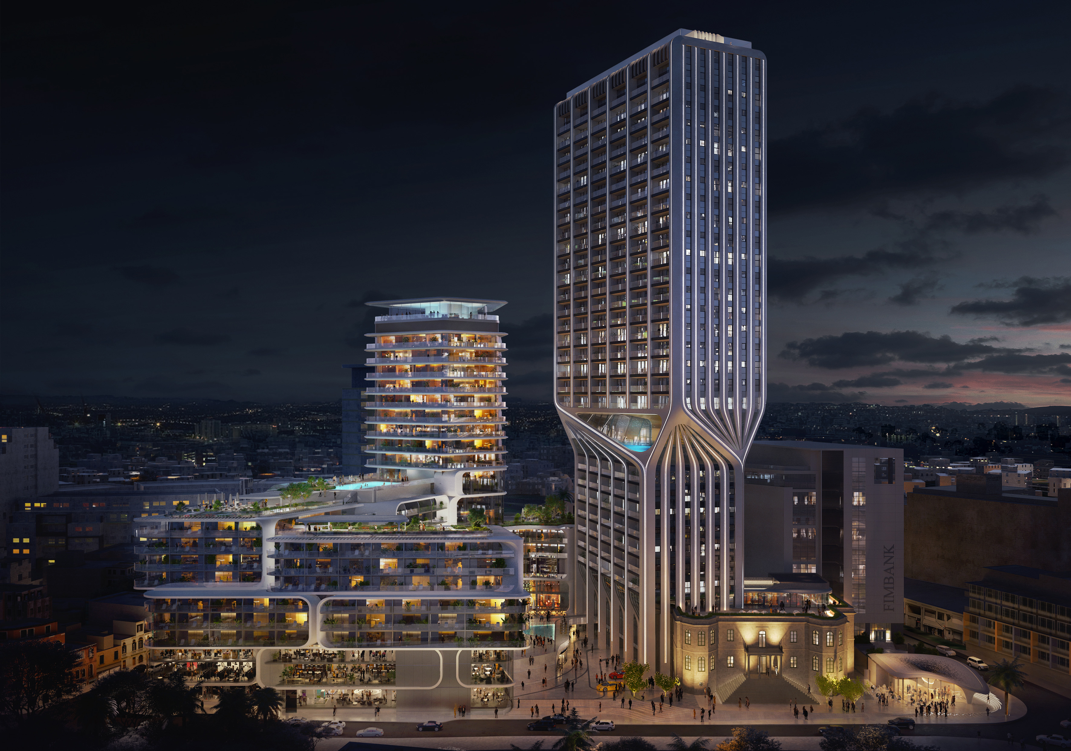 a group of tall buildings with lights