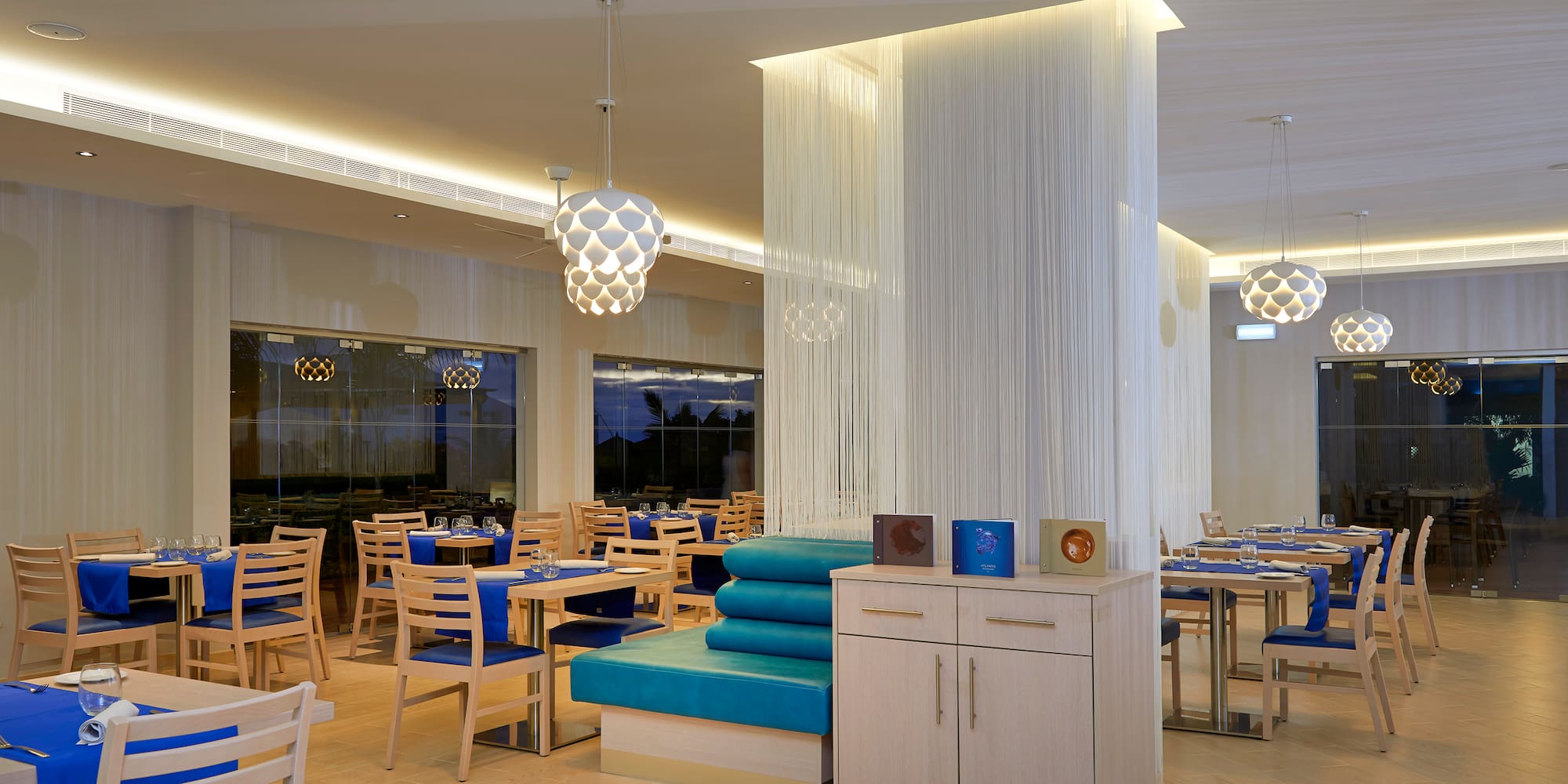 a room with tables and chairs