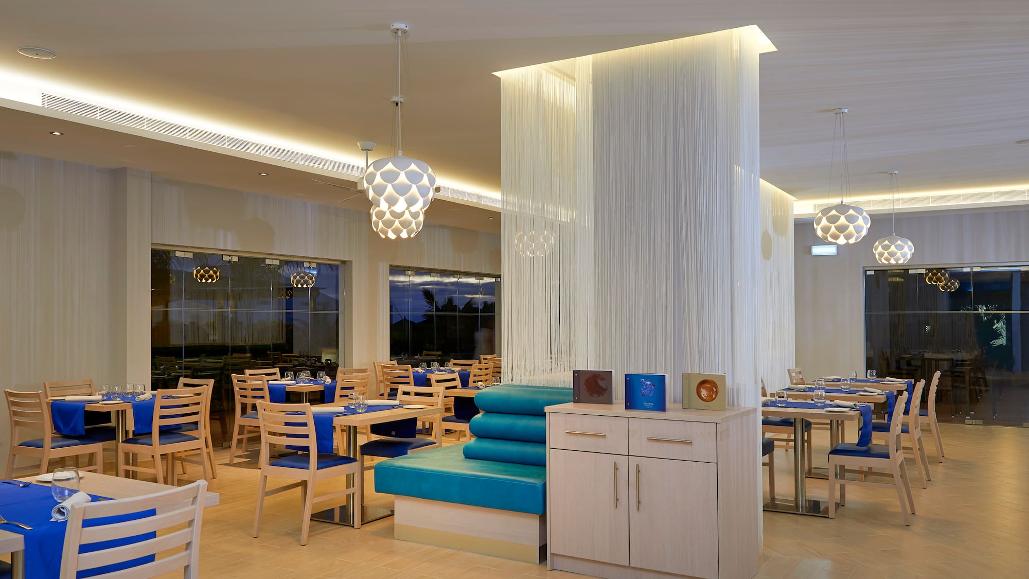 a room with tables and chairs