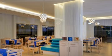 a room with tables and chairs