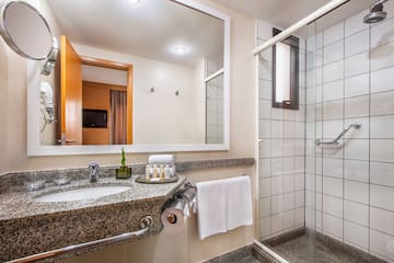 a bathroom with a mirror and sink