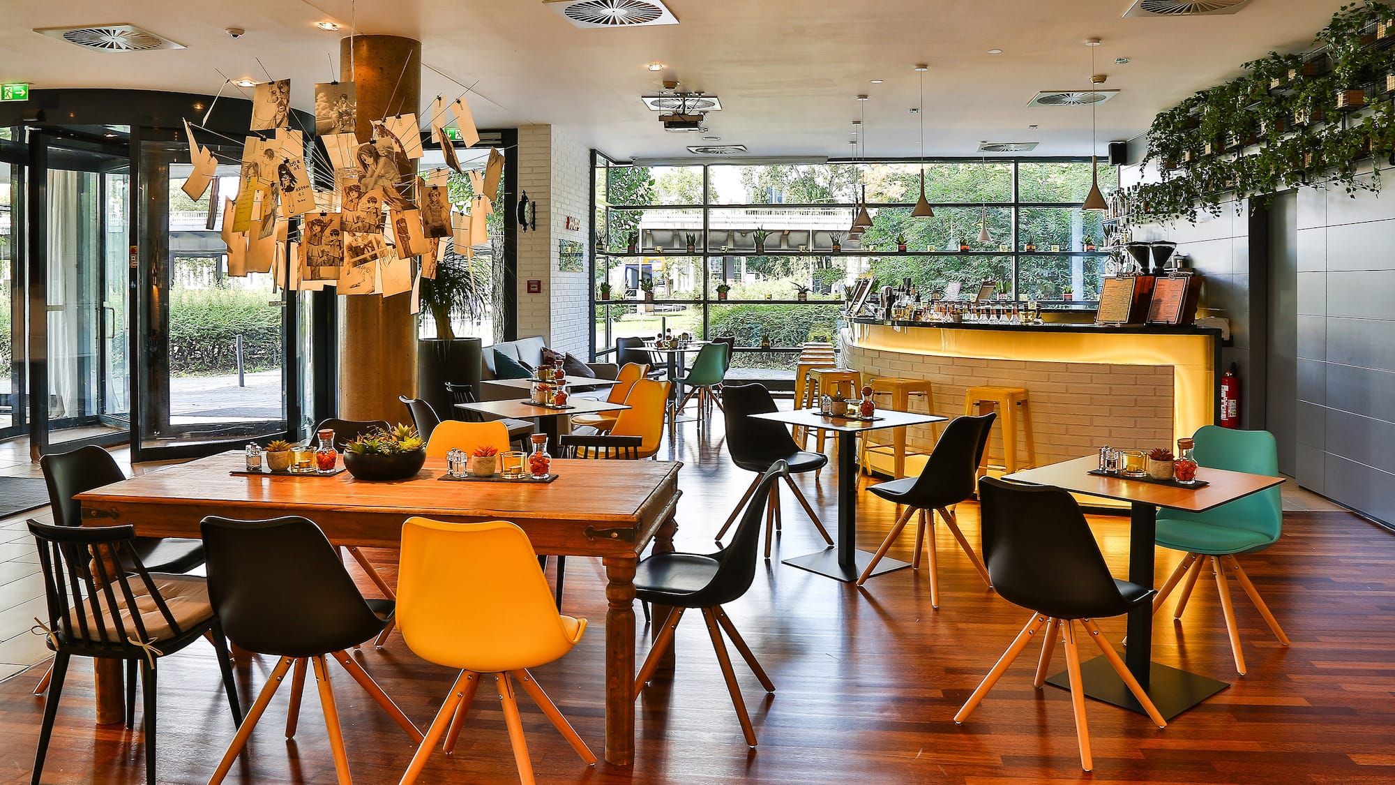 a restaurant with tables and chairs