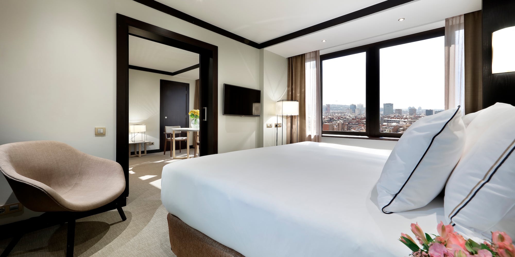 a room with a bed and a chair