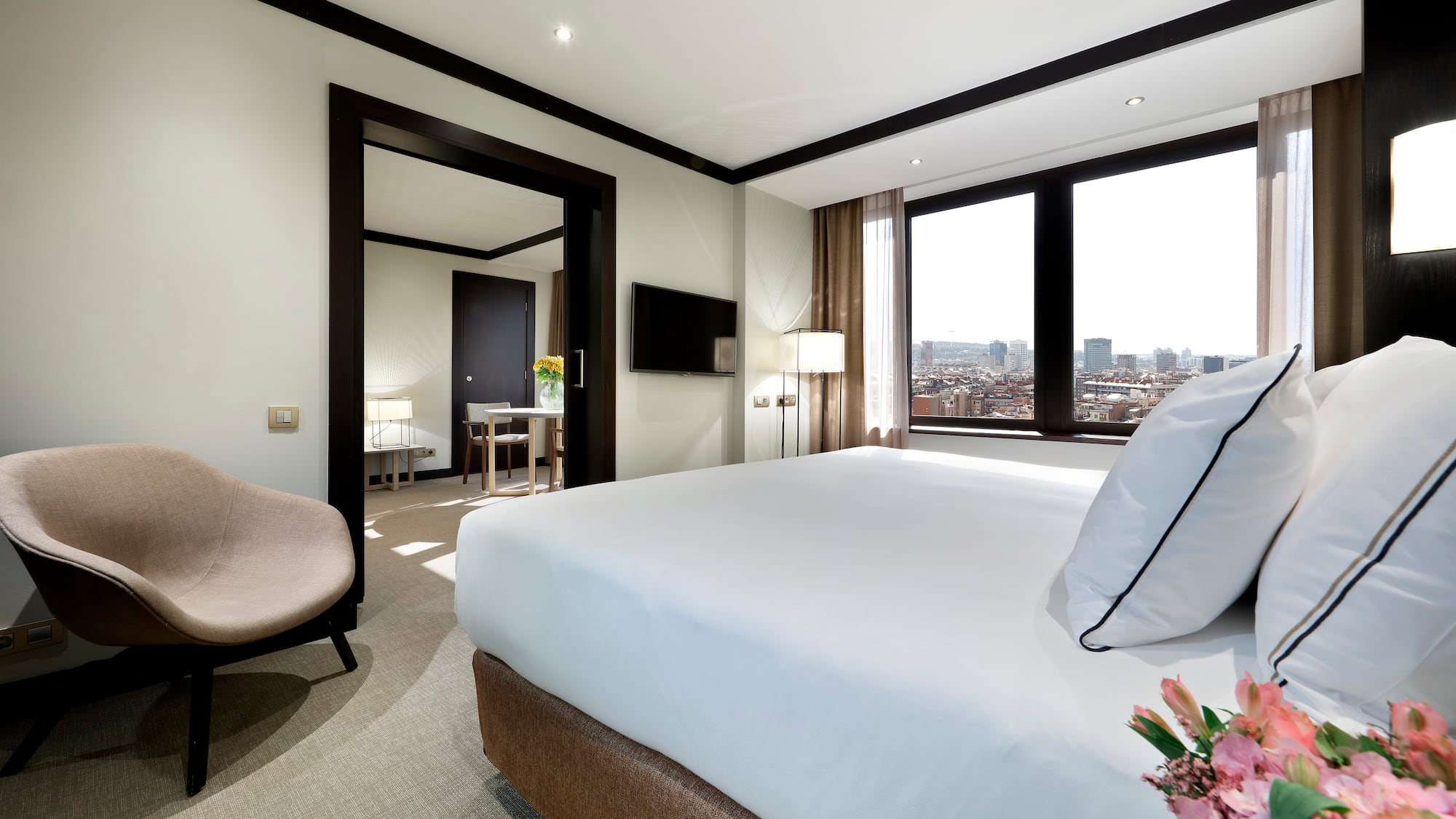 a room with a bed and a chair