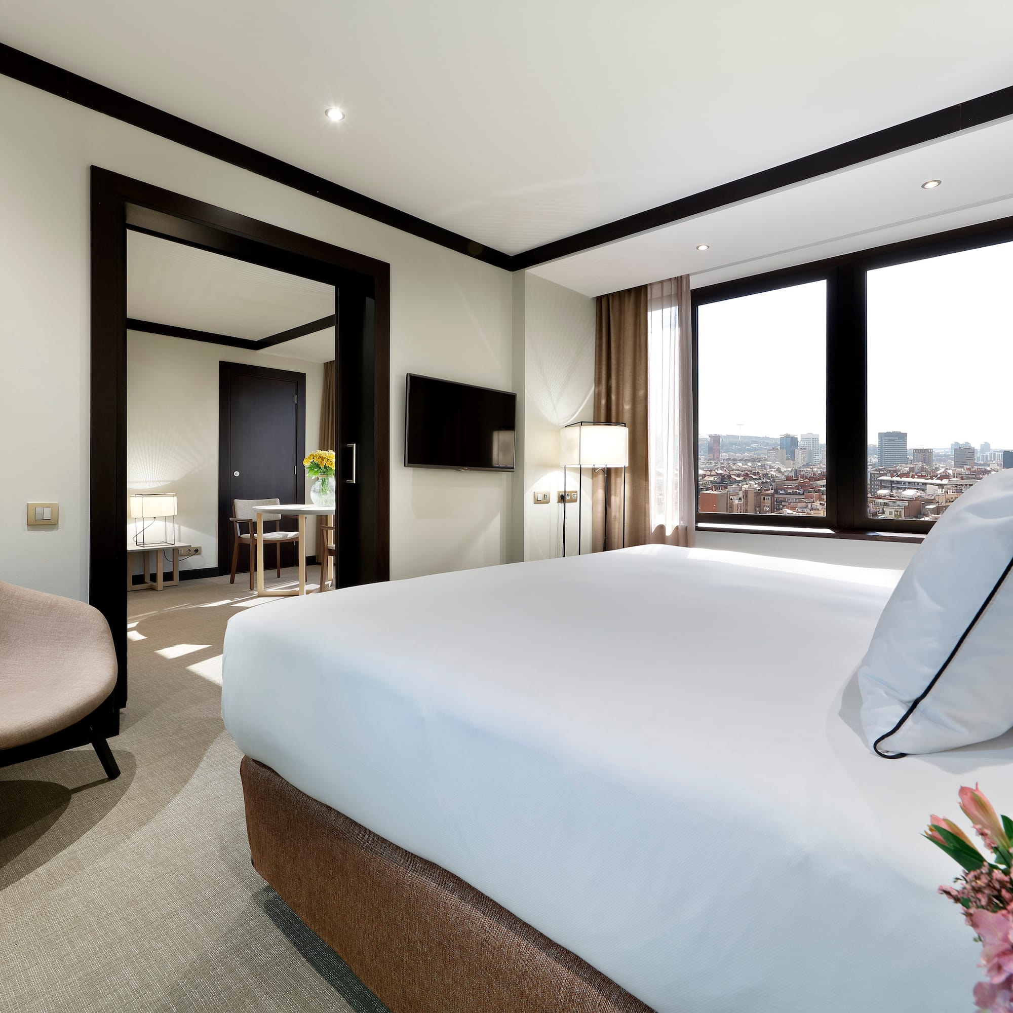 a room with a bed and a chair