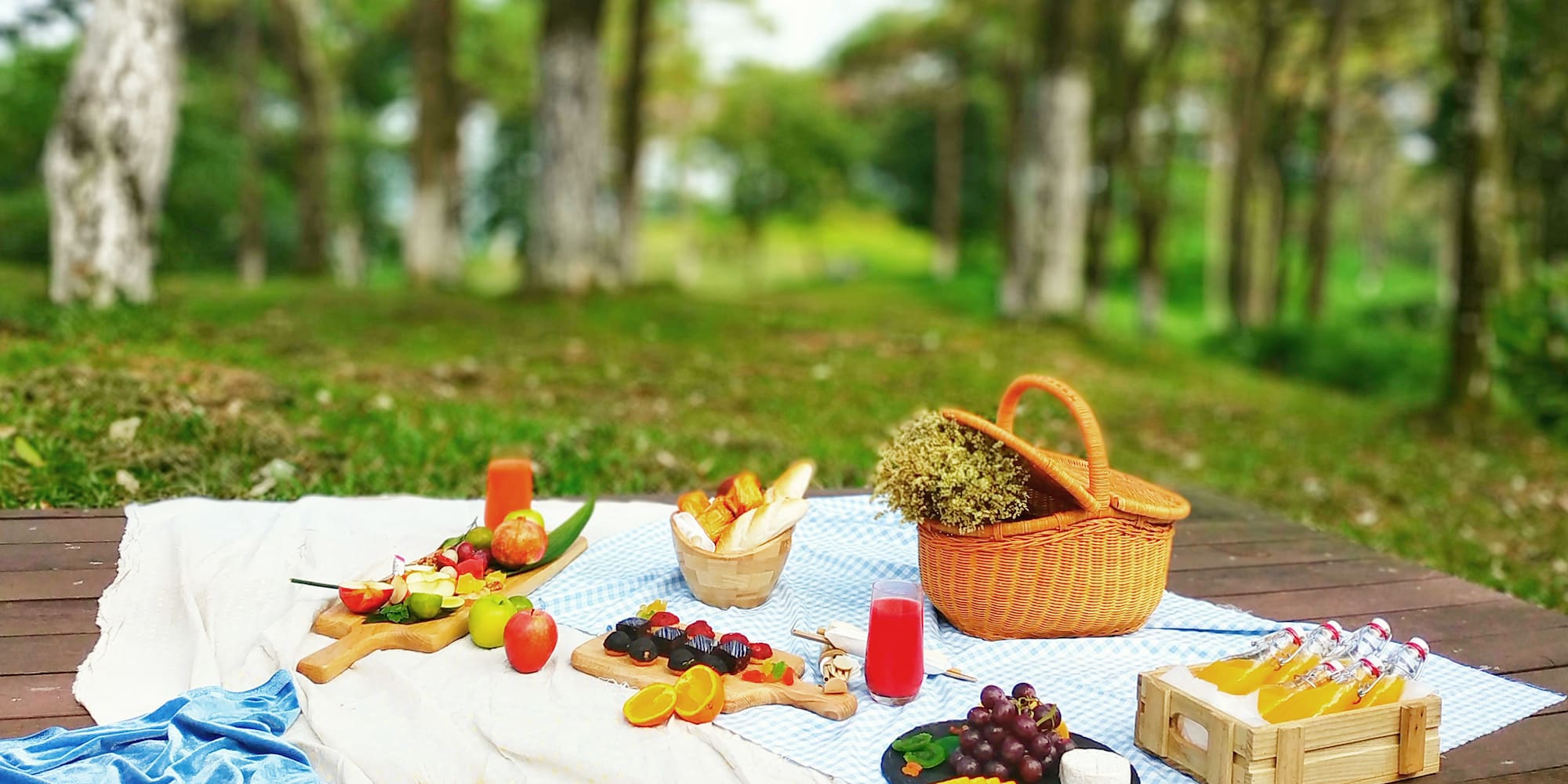 a picnic blanket with food on it