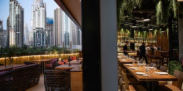 a restaurant with tables and chairs