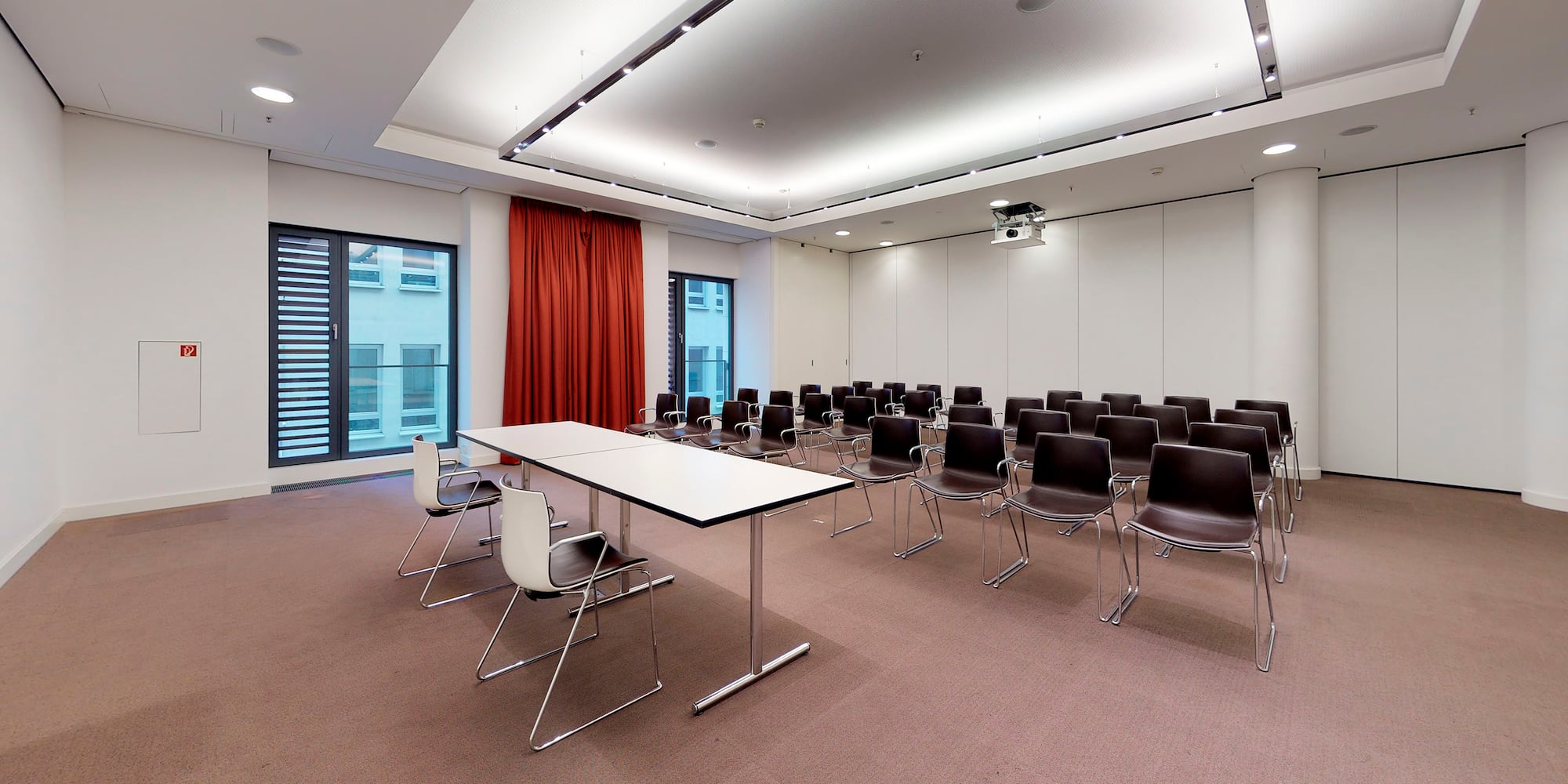 a room with a table and chairs