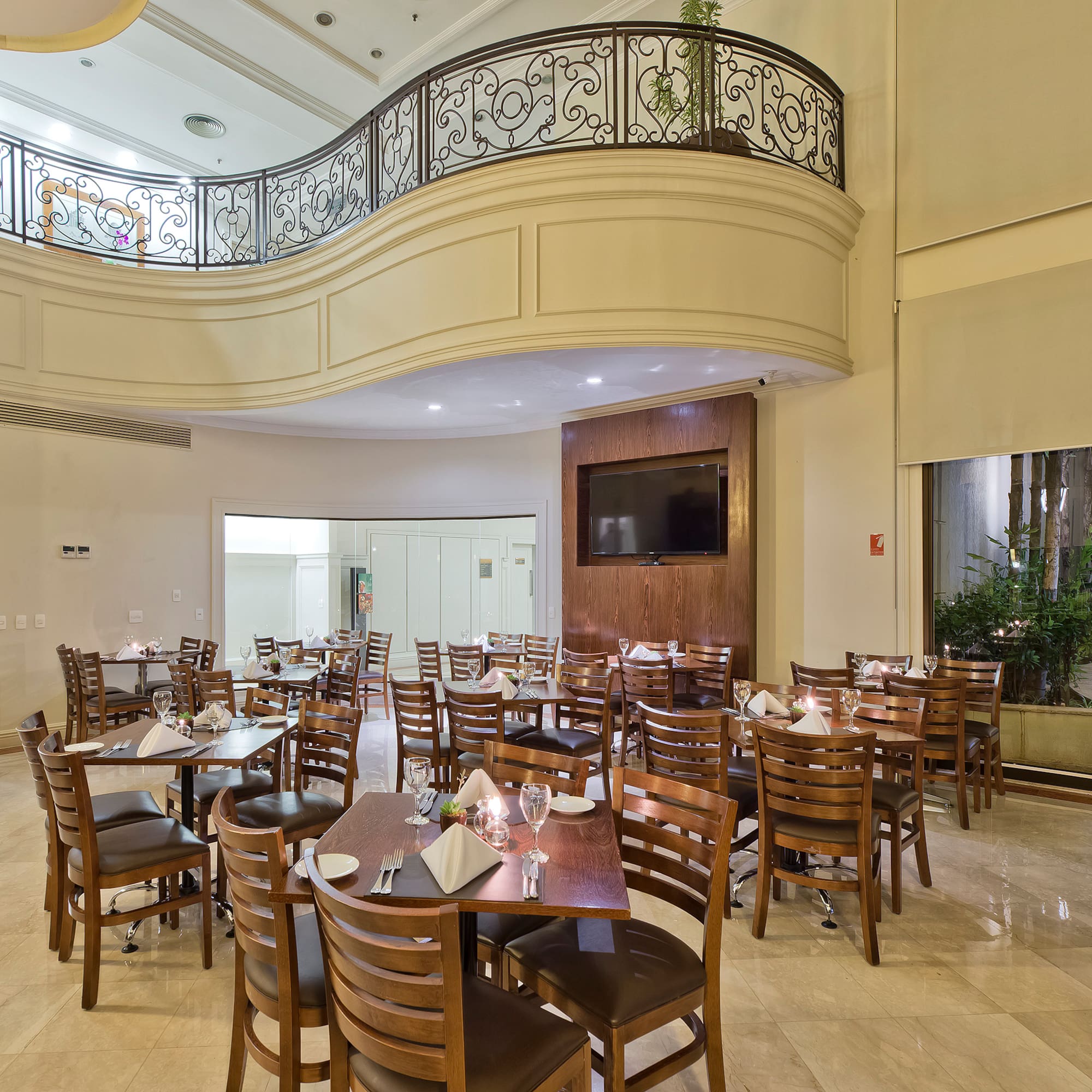 a room with tables and chairs