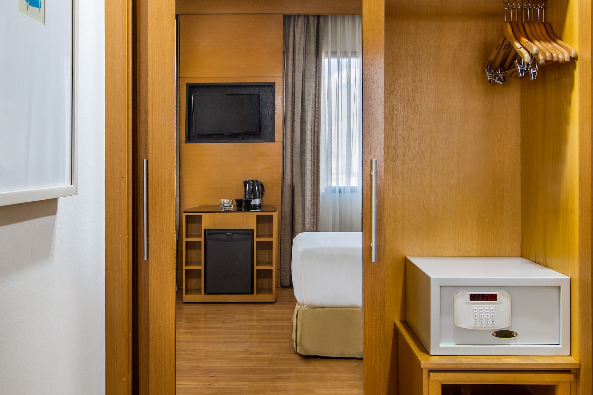 a closet with a door open