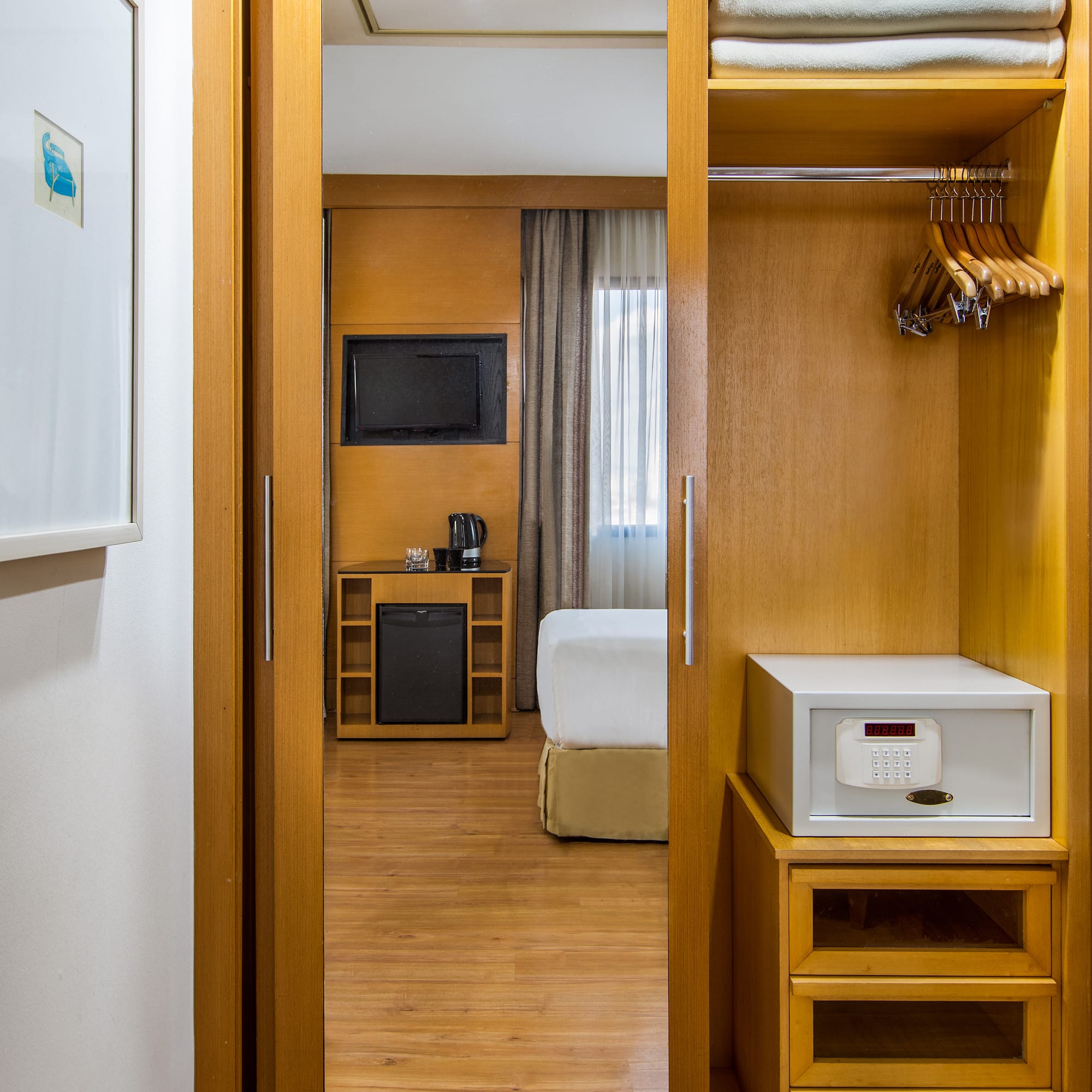 a closet with a door open