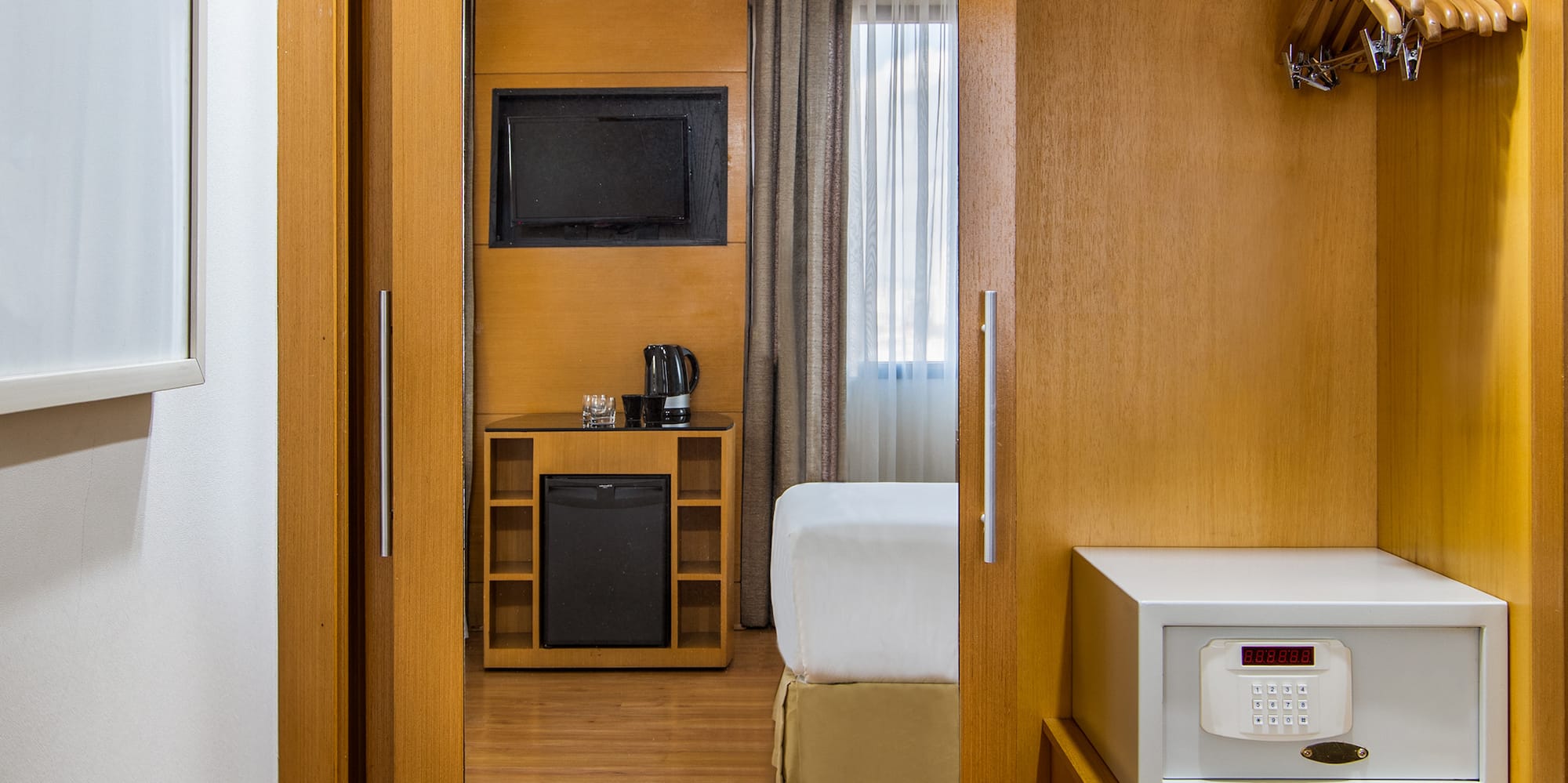 a closet with a door open