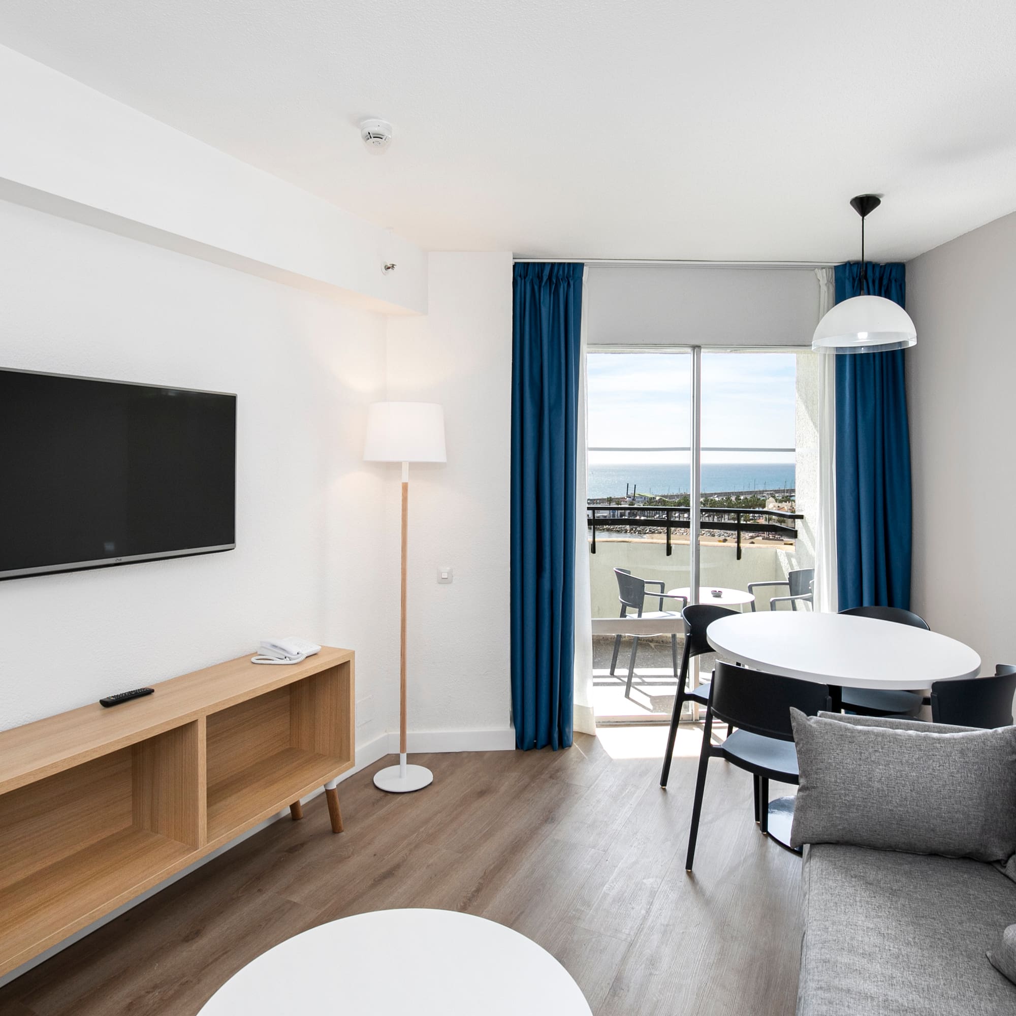 a room with a television and table