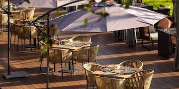 a table and chairs on a patio