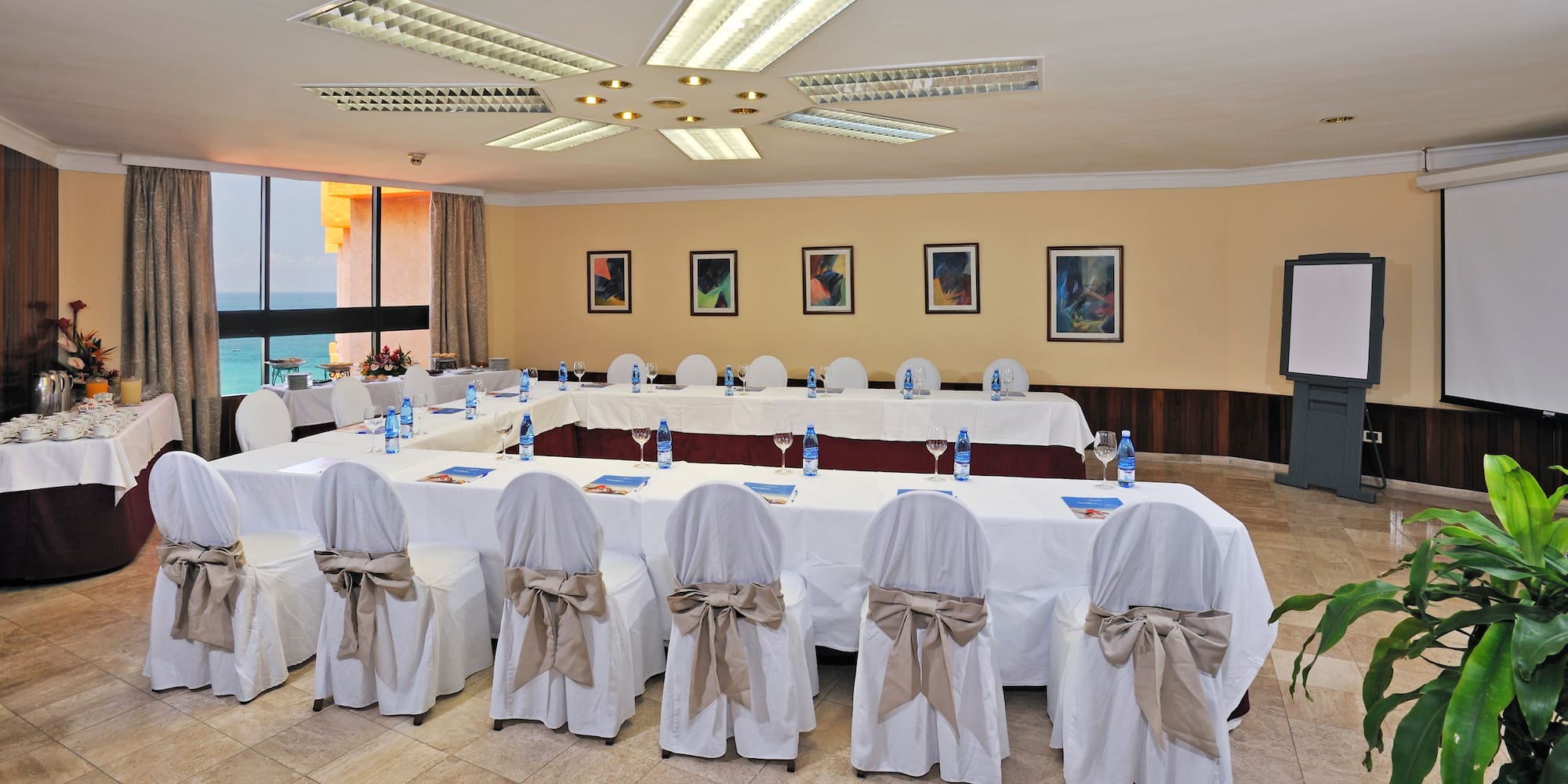 a room with tables and chairs