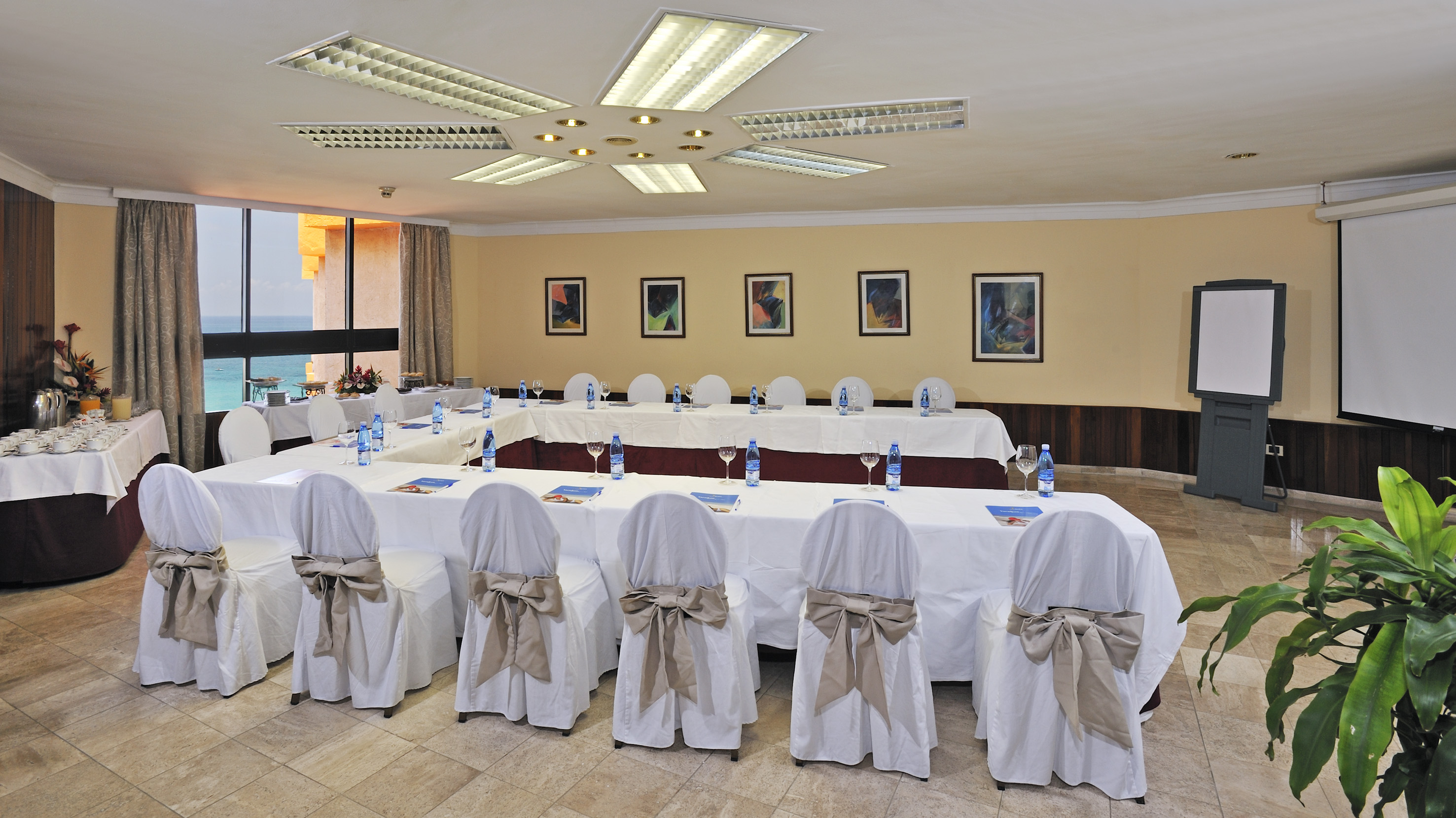 a room with tables and chairs