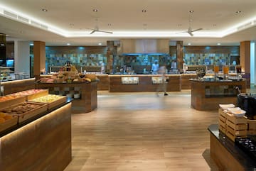 a food court with people walking