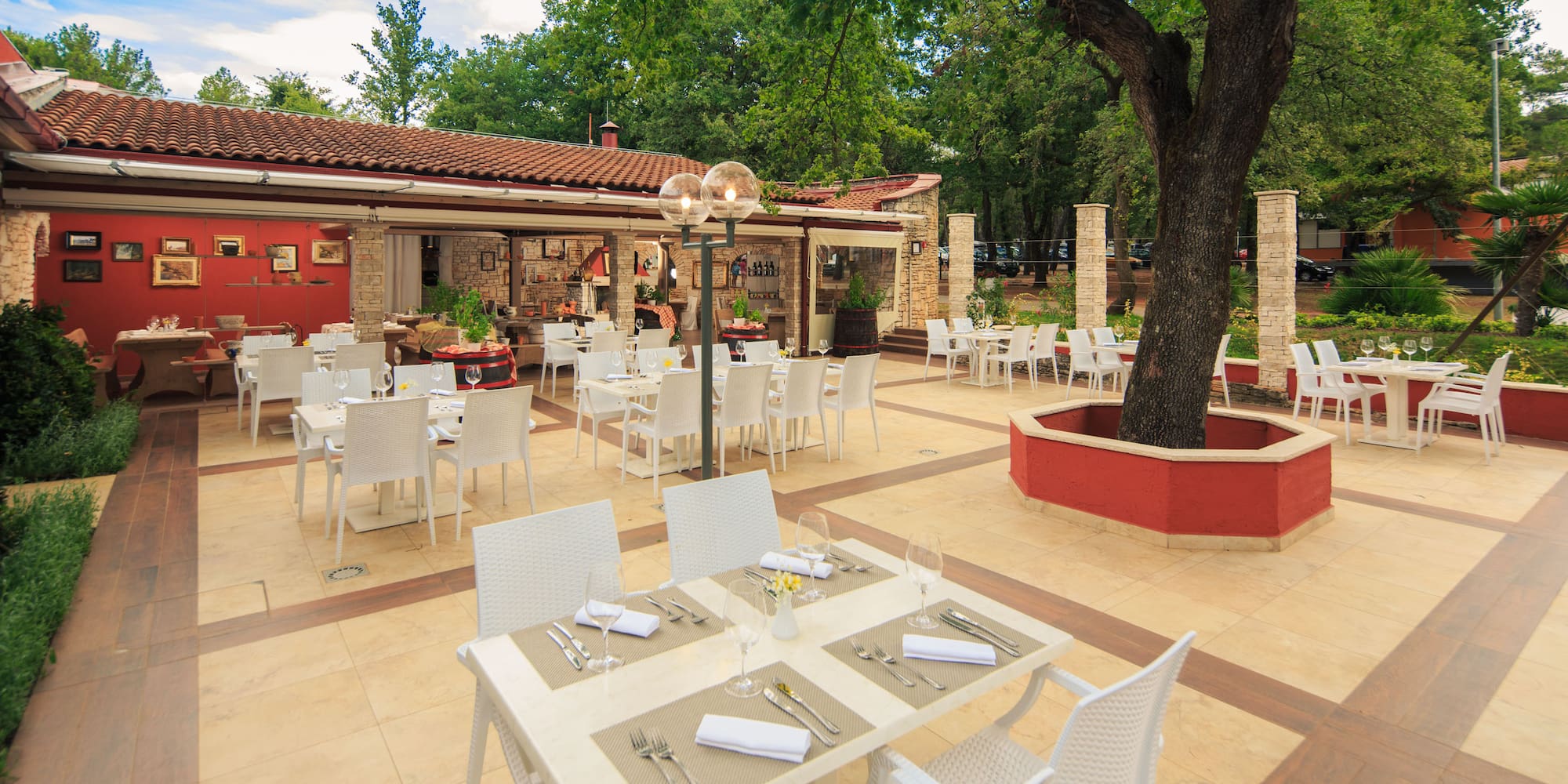 a restaurant with tables and chairs