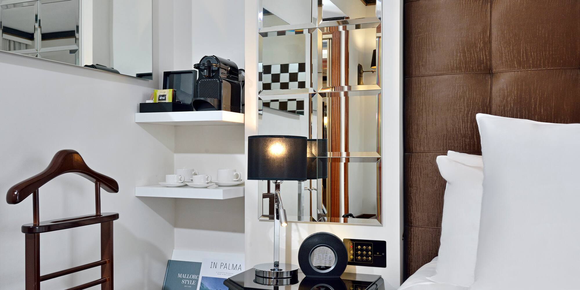 a mirror above a bed