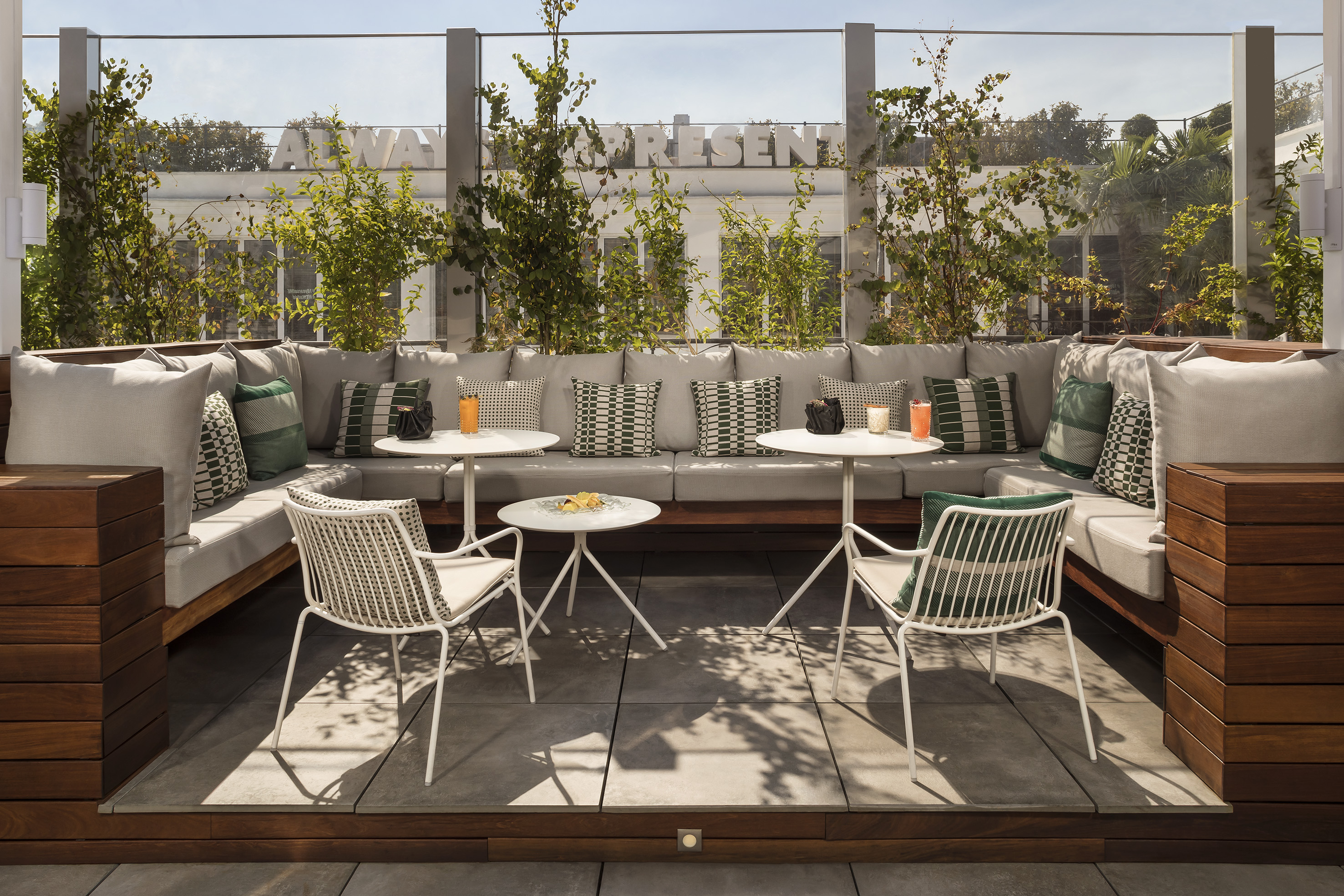 a patio with a table and chairs