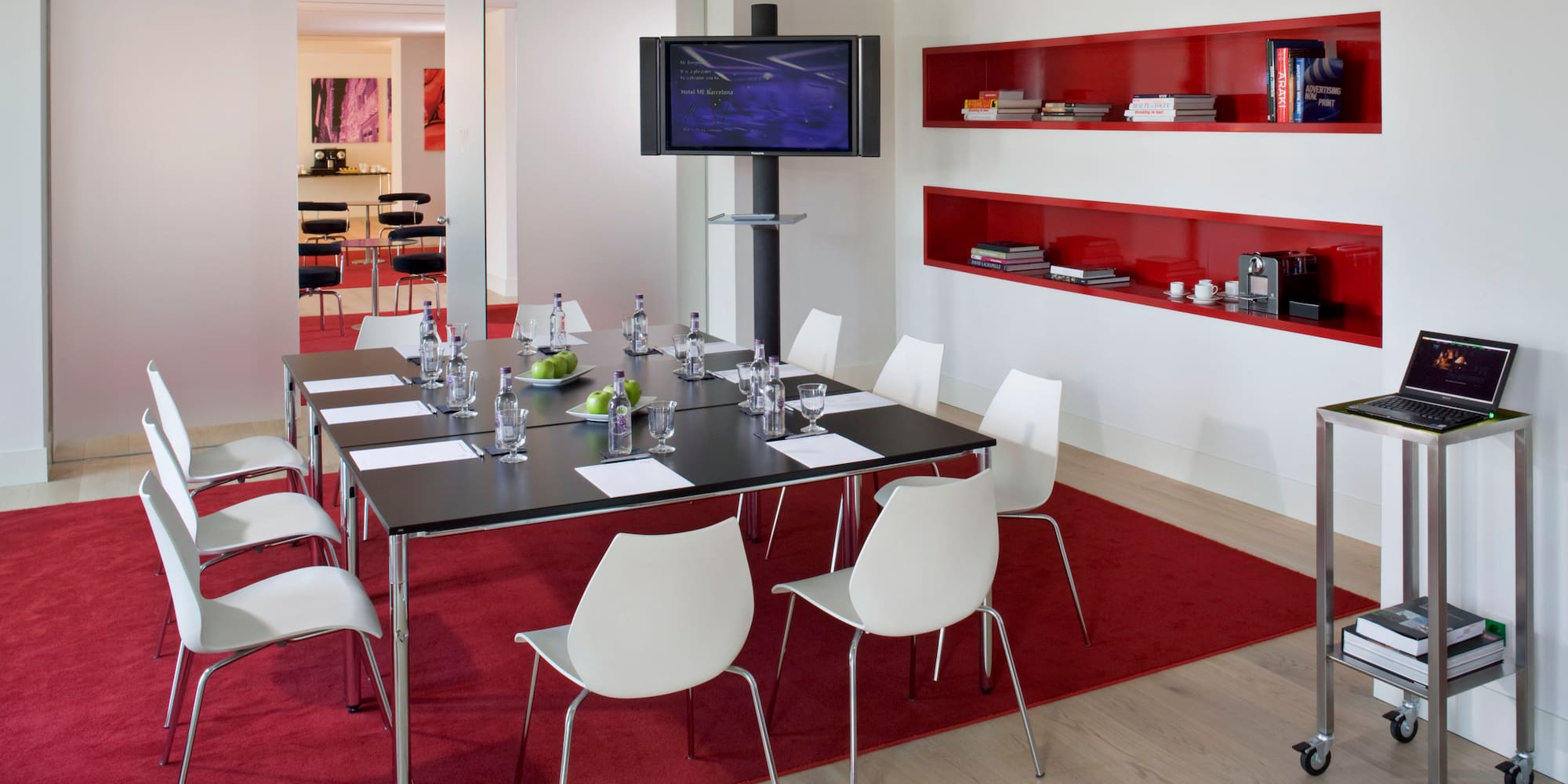 a room with a table and chairs