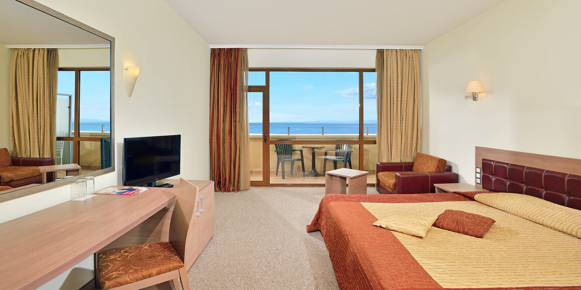 a room with a television and a bed