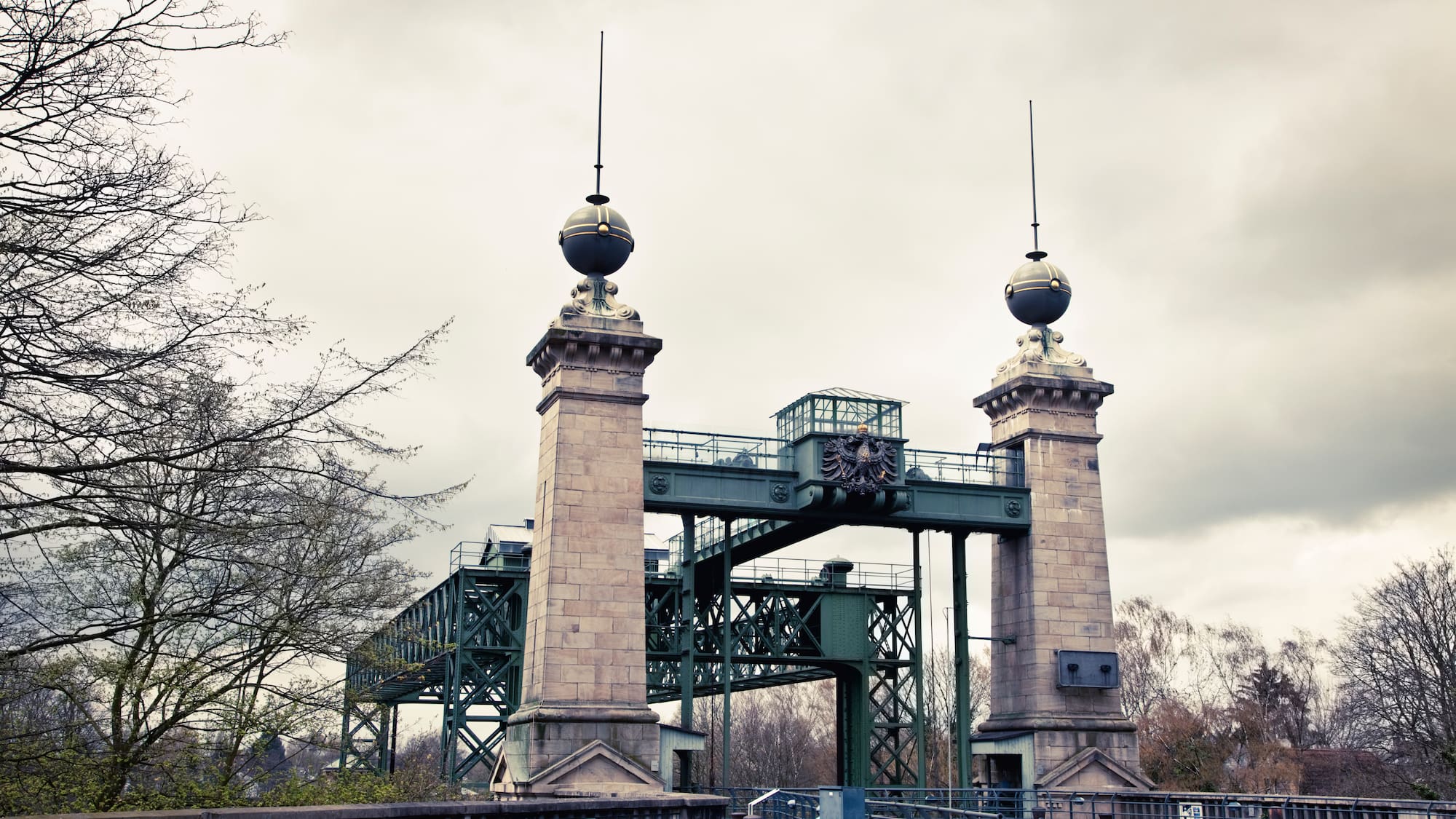 a bridge with towers and a bridge over it