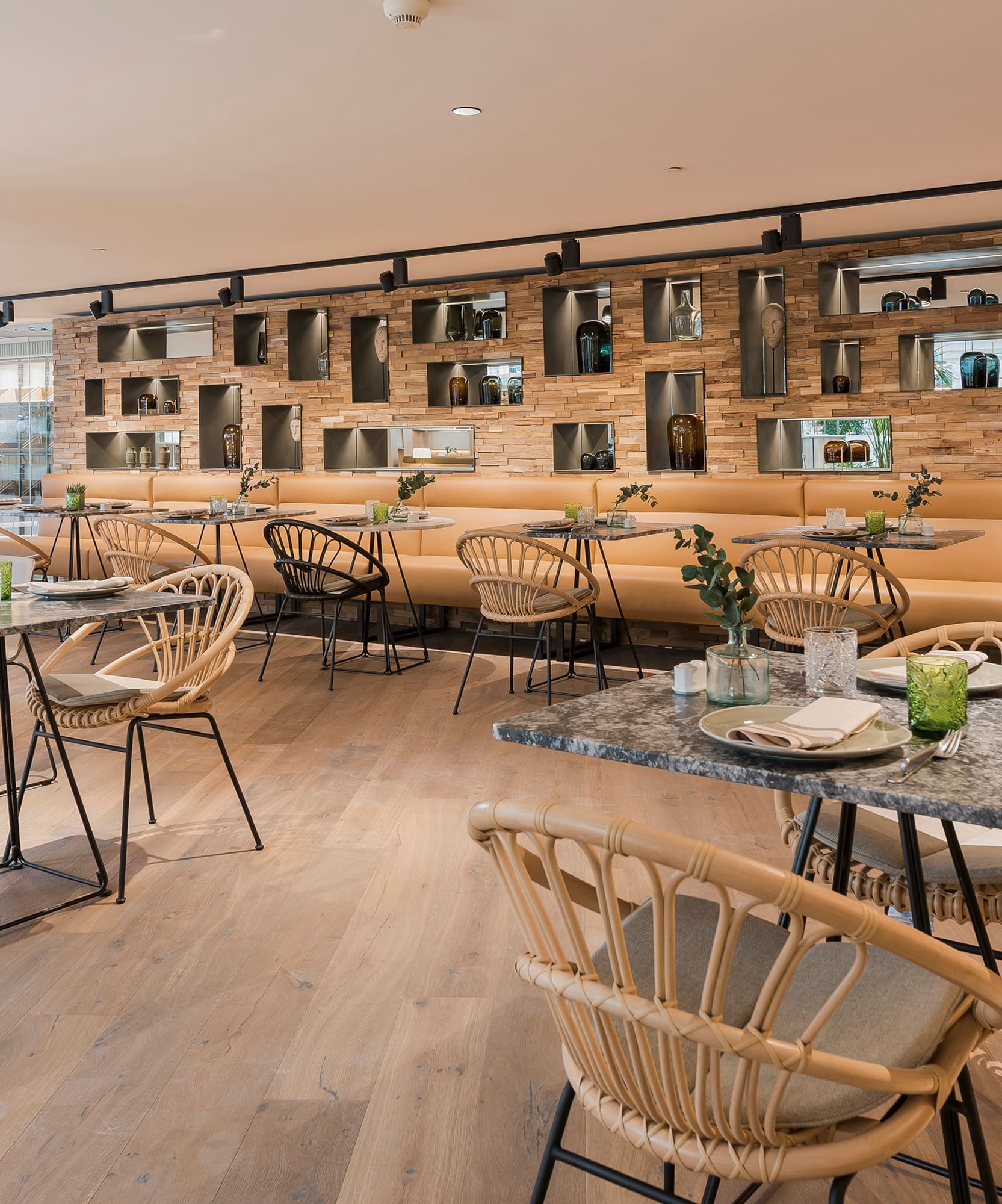 a restaurant with tables and chairs