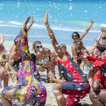 a group of people on a beach