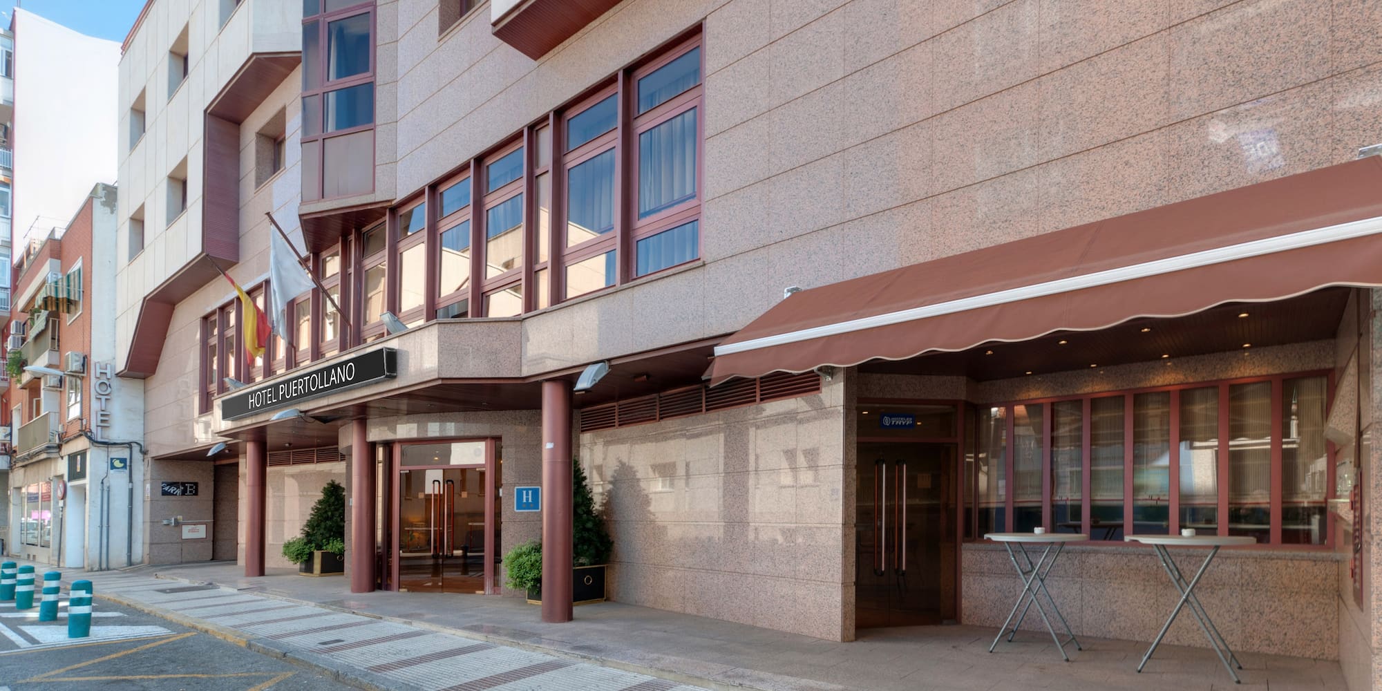a building with flags on the front