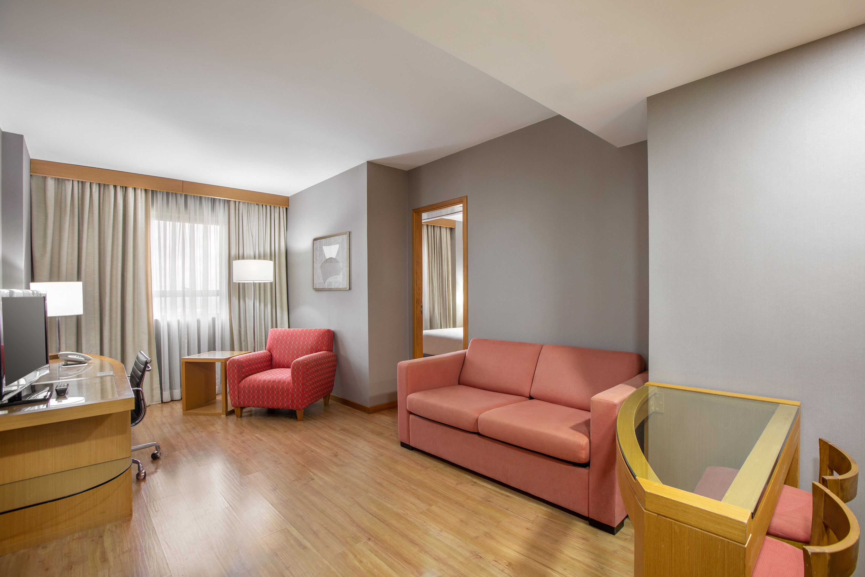 a room with a couch and a chair