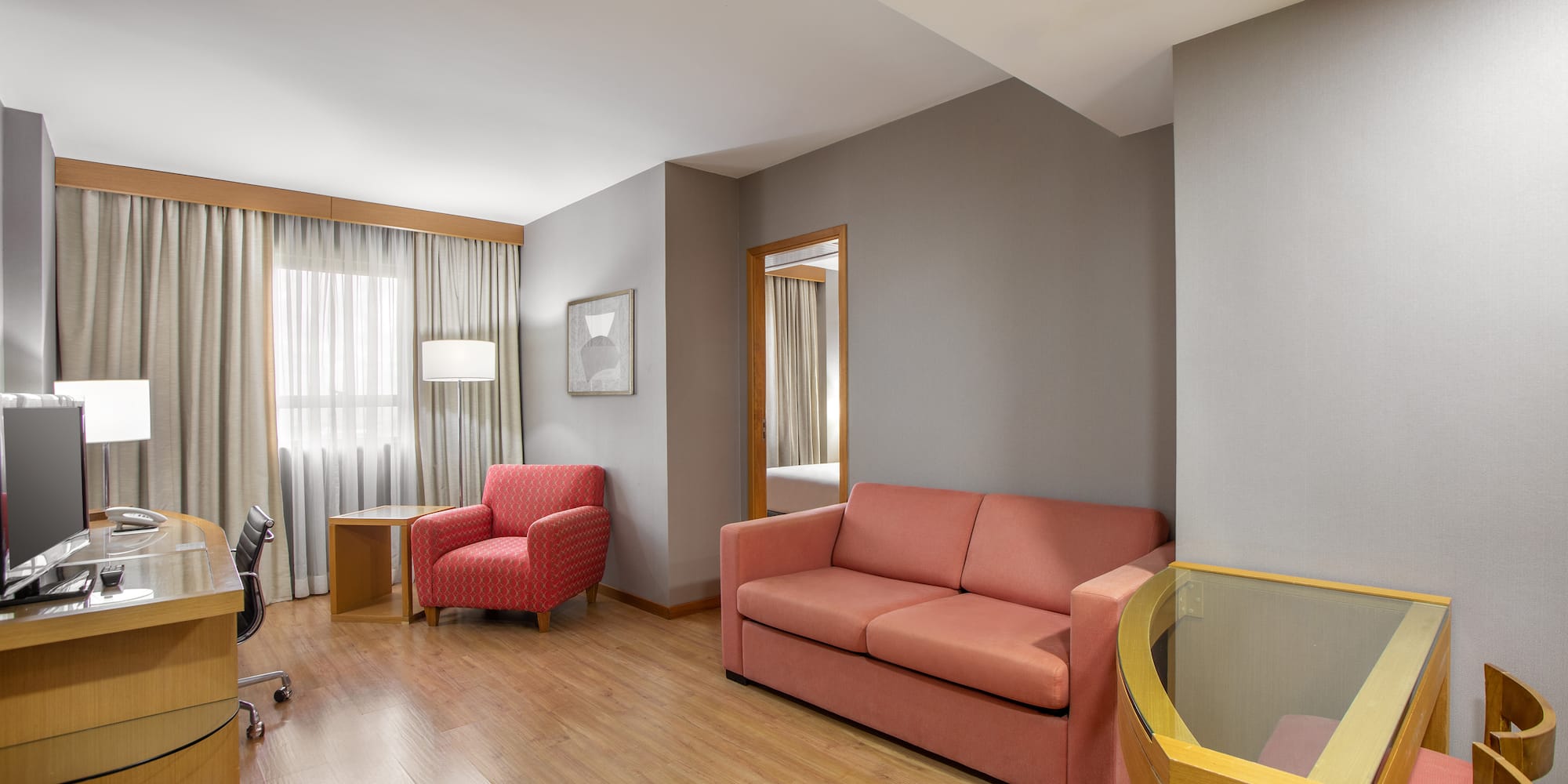 a room with a couch and a chair